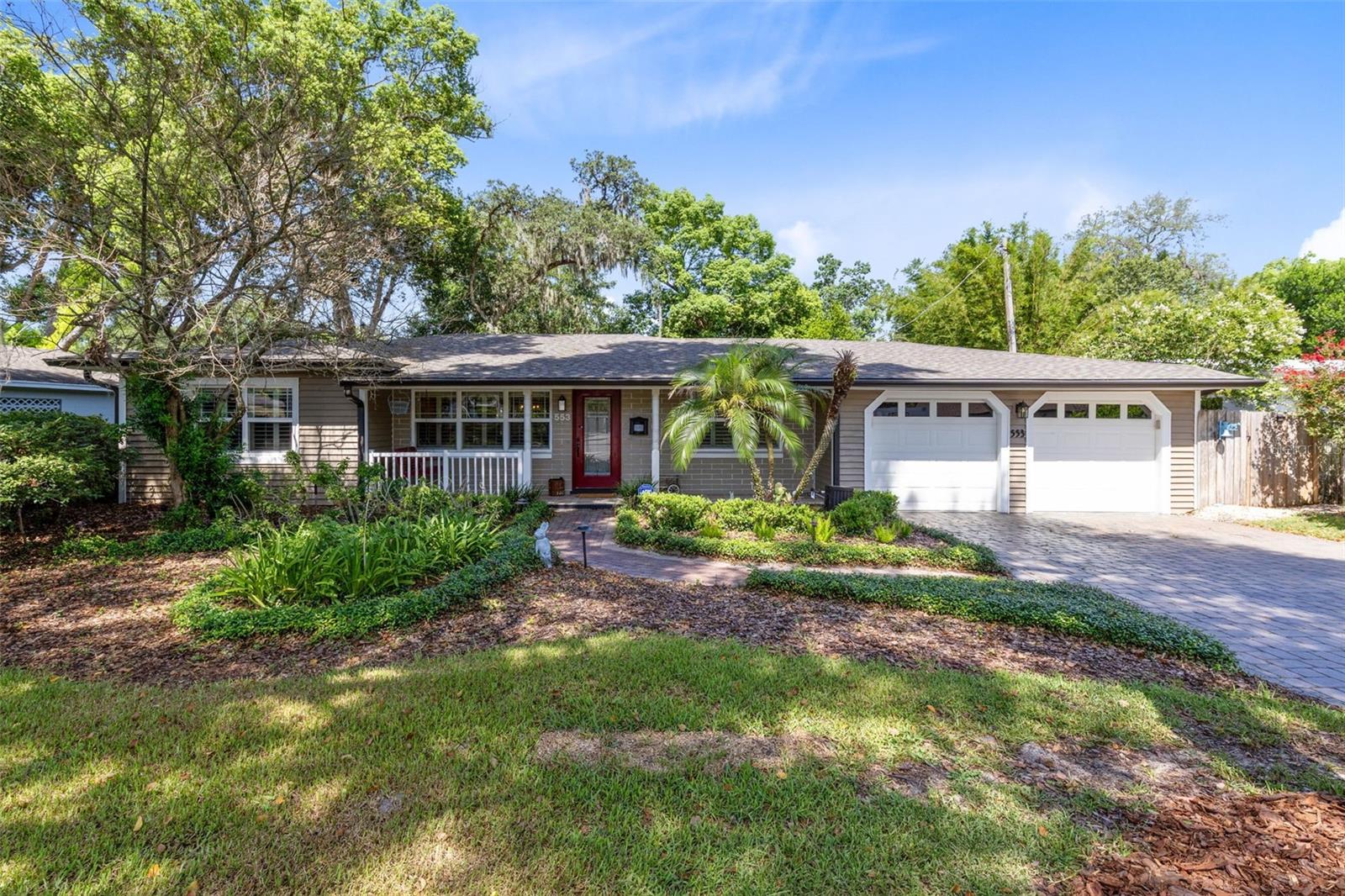 Welcome to 553 Arapaho Trail, where timeless MID-CENTURY CHARM meets thoughtful modern living in the highly sought-after DOMMERICH ESTATES community of Maitland. Offering OVER 1,500 SQUARE FEET of beautifully maintained living space, this 3-BEDROOM, 2-BATHROOM HOME features a desirable SPLIT FLOOR PLAN designed for both privacy and everyday comfort. From the moment you arrive, you'll appreciate the exceptional curb appeal with LUSH, MATURE LANDSCAPING, a NEWLY PAINTED EXTERIOR, and an EXTRA-WIDE, EXTRA-LONG BRICK PAVER DRIVEWAY with room for up to SIX VEHICLES. Inside, the home's original character has been carefully preserved while incorporating today's most important updates, including a NEW ROOF (2025), NEW GUTTERS, WHOLE-HOUSE REPIPE, ELECTRICAL UPGRADES, HARDWOOD FLOORING THROUGHOUT, NEW KITCHEN APPLIANCES, an UPGRADED PRIMARY EN-SUITE, stylish UPDATED LIGHTING FIXTURES, an EXTENDED ATTIC WITH ABUNDANT STORAGE, and a PAINTED GARAGE FLOOR. One of the neighborhood's rare homes with BURIED ELECTRICAL SERVICE, the property also offers a cleaner streetscape and added peace of mind. Step outside and discover your own private backyard retreat featuring an INCREDIBLE SCREENED-IN POOL, an expansive BRICK PAVER POOL DECK, and a charming BRICK PAVER GARDEN WALKWAY winding through beautifully landscaped grounds—perfect for entertaining or relaxing year-round. Beyond the home, DOMMERICH ESTATES continues to impress with its welcoming sense of community and location within one of Central Florida's most desirable school districts, originally designed around A-RATED SCHOOLS to make walking and biking to class safe and convenient. Residents also enjoy access to a VOLUNTARY, LOW-COST HOA that includes a PRIVATE BOAT RAMP to the WINTER PARK CHAIN OF LAKES, opening the door to BOATING, PADDLEBOARDING, FISHING, and unforgettable days on the water. The CITY OF MAITLAND offers the perfect balance of convenience and charm with its WALKABLE NEIGHBORHOODS, beautiful parks, local festivals, downtown concerts, and community events, while world-renowned PARK AVENUE in Winter Park is just minutes away for AWARD-WINNING DINING, BOUTIQUE SHOPPING, ART GALLERIES, and weekend brunch. This is more than just a home—it's an opportunity to experience one of CENTRAL FLORIDA'S MOST BELOVED NEIGHBORHOODS and lifestyles.