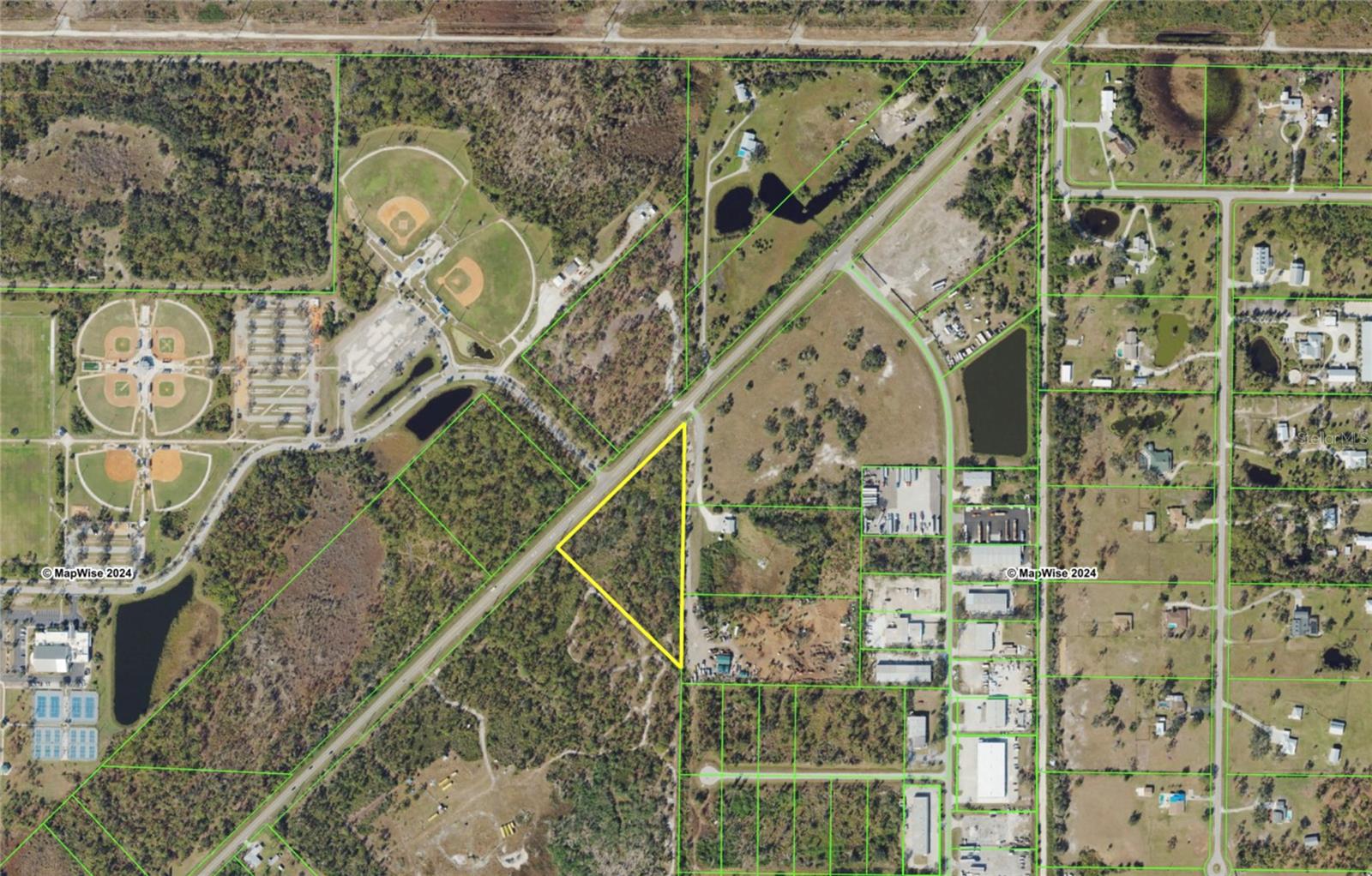 Rare PID zoning industrial site right across from Wellen Park. Roughly 660ft of frontage! Value priced, don't miss out!