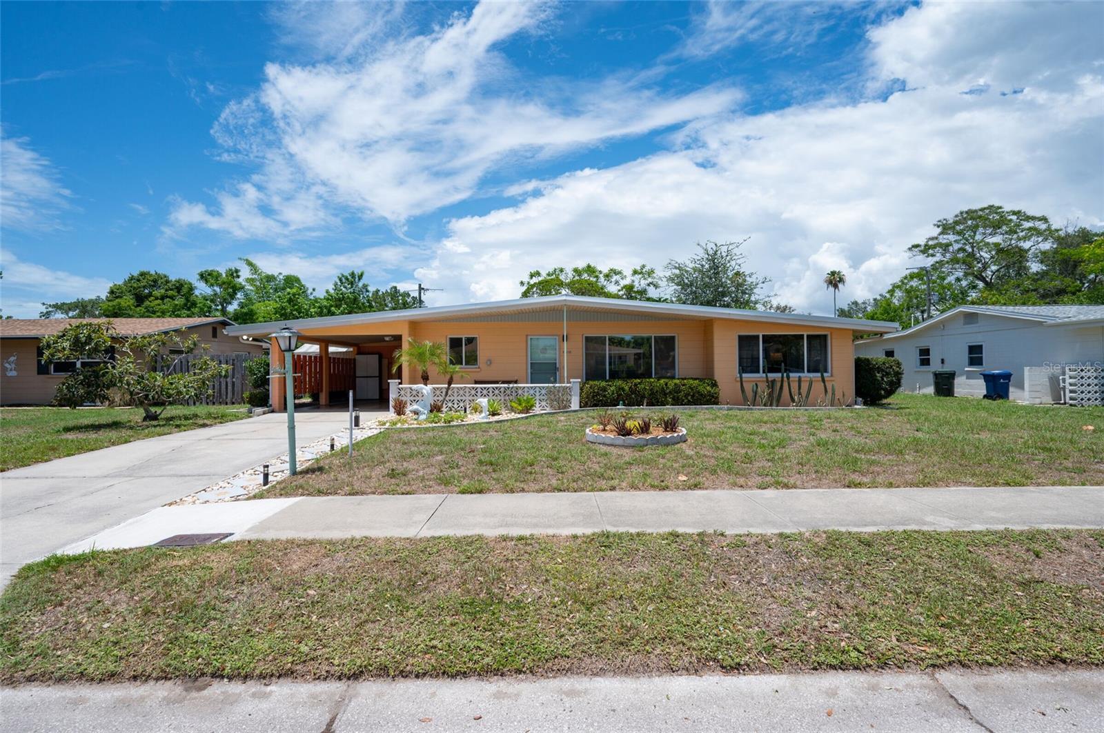 **Mid-Century Modern Gem in  Arlington Park**
This well-maintained mid-century modern home is located just blocks from Southside Elementary. Featuring a new metal roof, clean lines, and timeless style, it offers comfortable living with many original features like terrazzo floors and built-in cabinetry. 
Inside, you'll find bright, open spaces and a versatile area perfect for a possible third bedroom, office, or studio. The backyard is a standout, with an easement providing natural privacy and no direct rear neighbors.
Just minutes from all the best of downtown Sarasota, the North Bridge to Siesta Key, and The Arlington Park And Aquatic Center complete with a dog park, 50 meter pool, pickleball courts, and walking trails.
A rare blend of character, comfort, and unbeatable location. Call for a showing today!