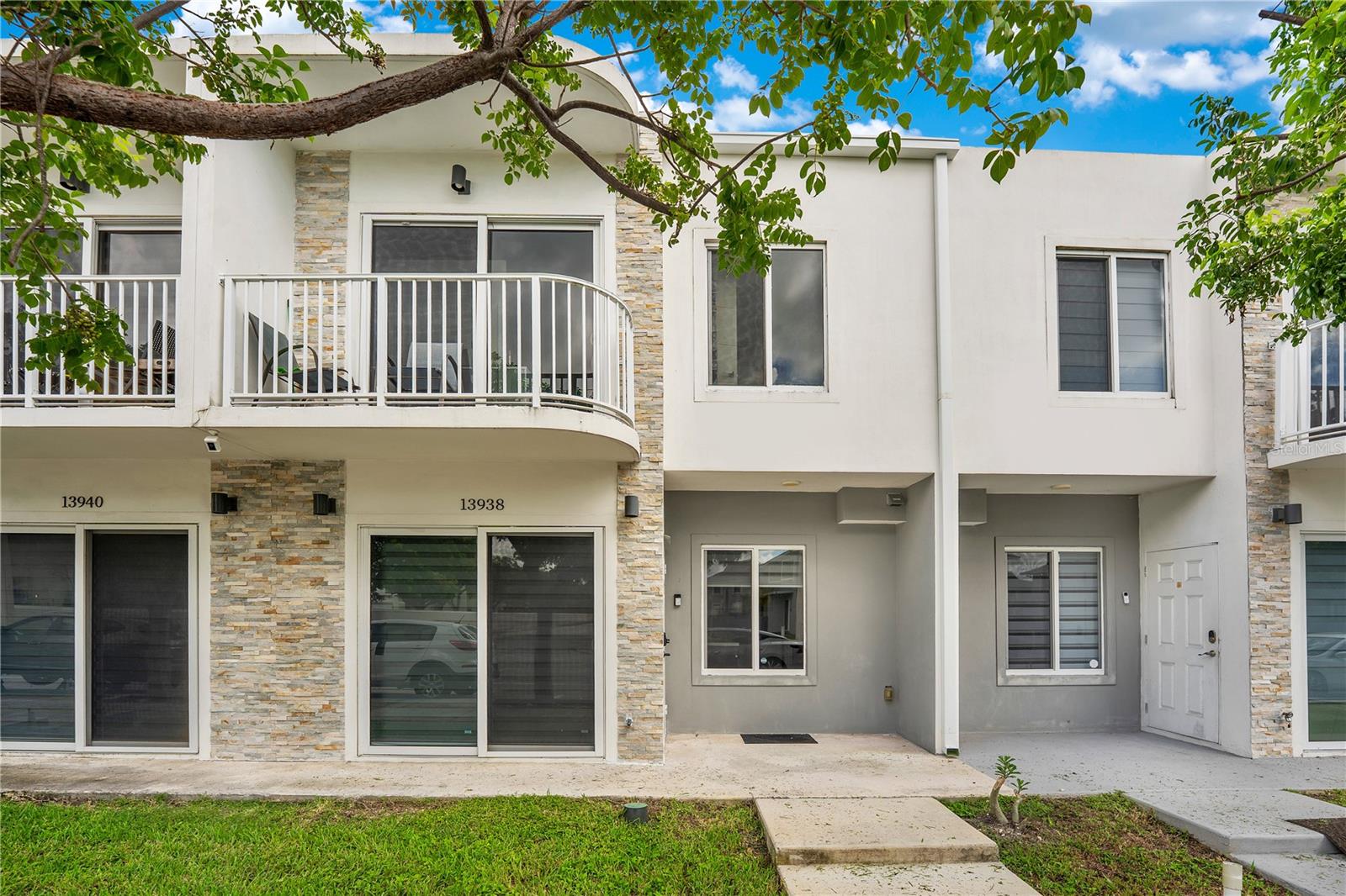 Receive a $3,899 lender credit at closing with this stunning 4-bedroom, 3.5-bath townhouse located in the desirable Paradise Gardens community! Built in 2020, this home blends modern design with functionality, featuring a bright, open-concept layout perfect for entertaining and everyday living.

The stylish kitchen boasts quartz countertops, stainless steel appliances, and a spacious breakfast bar overlooking the dining and living areas. Large windows fill the home with natural light, highlighting the sleek tile floors and fresh, contemporary finishes.

Enjoy the convenience of having the primary suite on the first floor, offering privacy and comfort, while upstairs you’ll find generously sized bedrooms, perfect for family or guests. Bathrooms are beautifully upgraded with elegant, modern touches.

Step outside to your private fenced patio, ideal for gatherings or quiet relaxation. With a low HOA, convenient Homestead location near shopping, dining, schools, and major highways, this move-in ready home is an exceptional opportunity for today’s buyers!