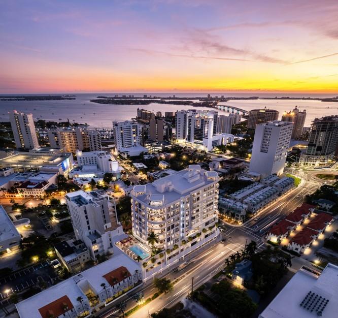 Under Construction. Move in this year! Residence 7B at The Edge Sarasota captures the essence of refined urban living in the heart of downtown’s vibrant Arts District. This impeccably designed three-bedroom, three-bath corner residence spans over 3,500 square feet, with floor-to-ceiling windows that fill the home with natural light. An open-concept layout is complemented by soaring ceilings and a chef-inspired kitchen featuring Italian cabinetry, quartz countertops, and a premium Sub-Zero and Wolf appliance suite thoughtfully curated for effortless, elevated living. A private terrace extends the living space outdoors, offering a serene retreat above the city’s energy. Residents enjoy exclusive access to a collection of resort-style amenities, including a pool with cabanas, state-of-the-art fitness center, yoga studio, sauna, secure parking, and pet-friendly features throughout. With just 27 residences, The Edge Sarasota offers an intimate boutique lifestyle just moments from the city’s celebrated dining, galleries, and cultural experiences perfectly reflecting Sarasota’s artful and walkable character. Renderings are conceptual and reflect the intended design and finish standards of the community.
