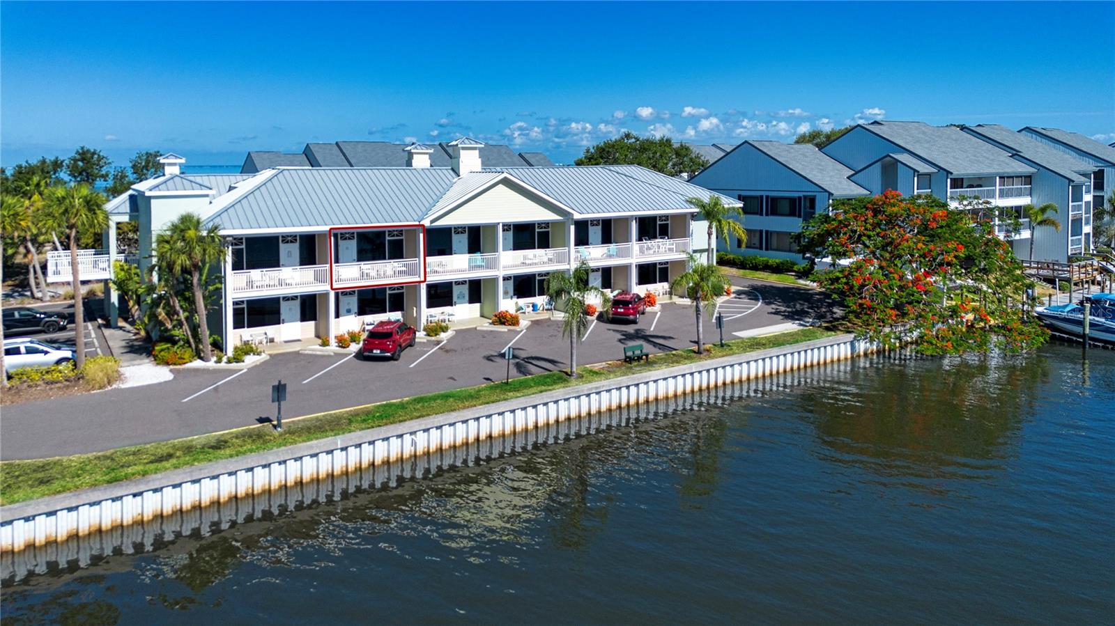 Now is your chance to own a turnkey, fully furnished WATERFRONT condo in the master planned community of Little Harbor. This beautifully updated and spacious condo with its king size bed, couch, full size refrigerator, microwave, and dining table and chairs provides a comfortable stay for owners/guests who relish Resort style amenities. The balcony welcomes you morning or night to enjoy coffee/refreshments as you watch motor yachts and majestic sailboats traveling to and from the open waters of Tampa Bay.  Within a few steps walk to one of two heated pools and two waterfront restaurants. This unique community located directly on Tampa Bay has a half mile of white sand BEACH, a playground, bocce and shuffleboard, a basketball court, tennis and pickleball courts, fitness center, clubhouse, and the two heated swimming pools. A beach front expanded tiki bar, indoor restaurant, as well as outdoor patio seating offer extraordinary Sunsets and live music weekly. This destination Resort type of lifestyle also has 2 deep water marinas along with a high & dry with slip availability. Freedom Boat Club is an additional option located on the property. A BOATER'S paradise with direct access to the Bay/Gulf. Nature enthusiasts enjoy canoeing & kayaking on the River and canals. FISHING mecca with daily charters also available. Onsite rentals of watersports - paddle boards, jet skis, etc. This condo represents an excellent opportunity as a vacation property, second home or investment. Property management available - DAILY rentals allowed - or can be self-managed. Convenient location - approximately a half hour drive to Tampa, St. Petersburg, Sarasota. Shopping, hospitals, restaurants, and golf courses nearby. Taxes INCLUDE CDD. Don’t hesitate another minute - call today to schedule an appointment to view this lovingly maintained condo and start enjoying the Florida lifestyle!