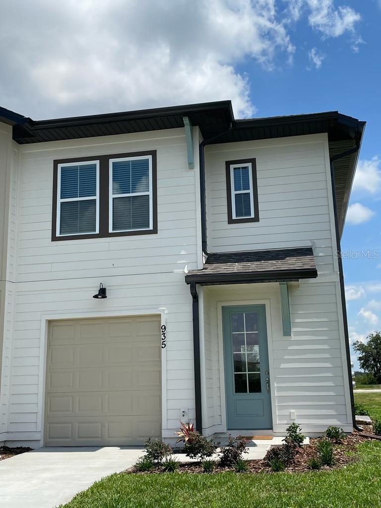 Fully furnished townhouse at Davenport, FL. $20,000 in improvements, tile flooring, lightning, kitchen cabinets among others. More than $23,000 in furniture, TVs, ceiling fans, leather couches, sofas, night table, etc. Ready to MOVE IN or start your AIRBNB SHORT TERM VACATION RENTAL BUSINESS. Samsung Stainless kitchen appliances. Washer and Dryer. Corner lot providing more natural light. This property is part of The Enclaves at Festival and provides access to a host of resort-style amenities, including a resort-style community pool, miniature golf, water park, fitness center, and a sand volleyball court. It is perfectly located for those who want to be located in Champions Gate and close to Disney, a variety of shopping options, an eclectic dining scene, several golf courses, and easy highway access.
