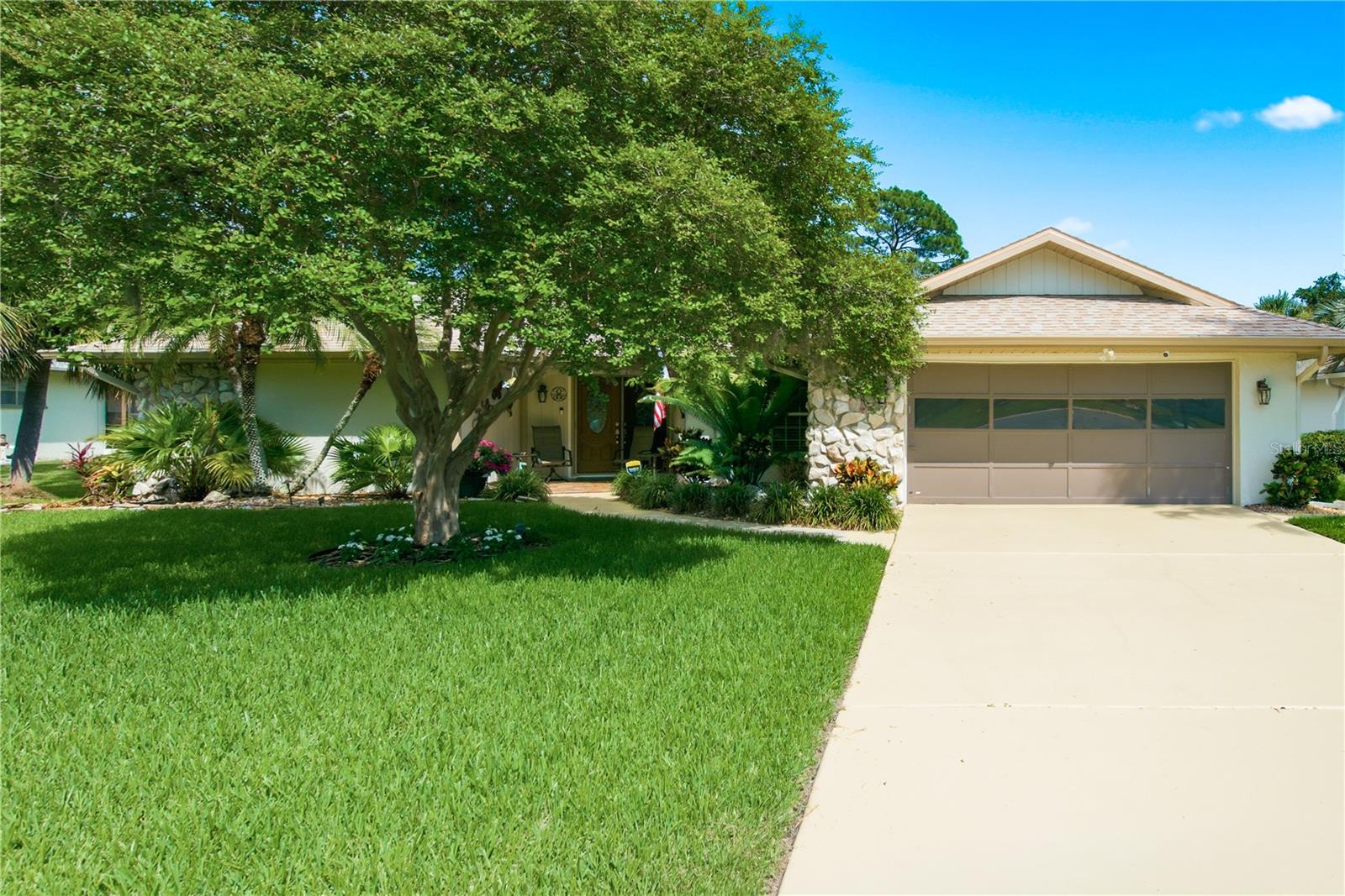 Here is the updated version. I have adjusted the text to emphasize that the entire exterior envelope of the home—windows, garage door, and entry doors—is fully hurricane-proof for maximum storm protection and potential insurance discounts.
Welcome to your ultimate coastal retreat in the highly desirable Gulf Harbors Woodlands! This stunning property offers total peace of mind with extensive, storm-ready mechanical upgrades completed within the last two years. Rest easy knowing the ROOF, HVAC system, ELECTRICAL panel, and WATER HEATER are all practically brand new. Best of all, the entire home features ultimate storm protection with HURRICANE-PROOF windows, a hurricane-rated garage door, and high-impact exterior doors throughout!
Step inside to an expansive open floor plan featuring soaring high ceilings, updated modern finishes, and gorgeous, low-maintenance flooring. A massive standout feature is the incredible Florida Room addition—fully heated and cooled—offering a bright, year-round second living space with panoramic backyard views. For added peace of mind, the home comes equipped with a premium Ring security system featuring convenient door-open notifications.
Living here means embracing a world-class resort lifestyle. The low-fee community association grants you exclusive access to a heated neighborhood pool, tennis courts, and a private boat ramp. For the ultimate beach day, choose to join the private Gulf Harbors Beach Club to relax under a cabana, or check out the active nearby Yacht Club for waterfront dining, rentable boat slips, and a packed social calendar. Don't miss this turnkey home in a premier Florida community!
BONUS INCLUSIONS: To make this home truly move-in ready, the outdoor grill, patio setup, and the beautiful Florida Room furniture are all included with the sale!