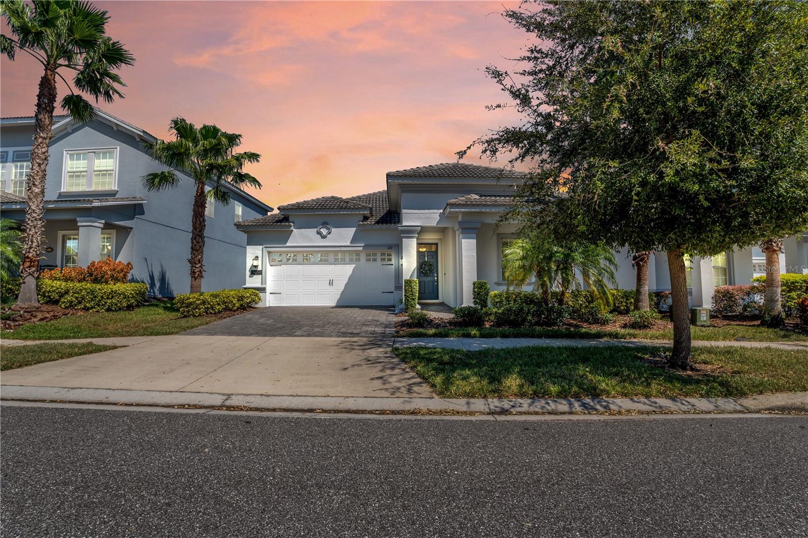 FULL GOLF & TENNIS MEMBERSHIP INCLUDED IN HOA! LIVE LIKE A CHAMPION!

Welcome to 1419 Pro Shop Court, a beautifully maintained 4-bedroom, 3-bathroom home with a 2-car garage located in the prestigious gated community of ChampionsGate Country Club. Situated on a quiet, private homesite in highly desirable Phase 2, this exceptional residence has been lovingly maintained by its original owners and used exclusively as a secondary vacation home, resulting in remarkably light use and outstanding condition.

Professionally decorated and beautifully furnished, this home shows like a model and has been meticulously cared for from day one. Every room reflects pride of ownership, making this a truly move-in-ready opportunity. The seller would consider selling the home furnished under the right terms, offering buyers the potential for a seamless turnkey purchase.

This light and bright residence features a versatile open floor plan designed for both comfortable everyday living and effortless entertaining. The spacious living and dining areas flow seamlessly into the kitchen, creating an inviting central gathering space for family and guests alike. Large windows throughout the home fill the interior with natural light, creating a warm and welcoming atmosphere.

The thoughtfully designed layout includes four generously sized bedrooms and three full bathrooms, providing flexibility for family, guests, or a home office. The spacious primary suite offers a peaceful retreat, while the additional bedrooms provide comfort and privacy for everyone.

Step outside to the covered lanai and enjoy the peaceful setting of this quiet homesite, perfect for morning coffee, evening relaxation, or entertaining friends and family.

Living in ChampionsGate Country Club means enjoying one of Central Florida’s premier resort-style communities. Residents have access to the renowned Oasis Club, a 14,000-square-foot clubhouse featuring a full-service restaurant, movie theater, state-of-the-art fitness center, game room, tiki bar, lazy river, water slides, private cabanas, and resort-style pools. Homeowners also enjoy access to The Plaza, the exclusive residents-only clubhouse offering another restaurant and bar, fitness center, game room, pool, and a $75 monthly food and beverage credit. For even more recreation, the Retreat Club features an additional water park, outdoor dining, and resort-style amenities.

The HOA includes full golf and tennis membership, gated security, complete lawn maintenance, cable, internet, phone, trash service, and security monitoring, providing a truly maintenance-free lifestyle.

Conveniently located near world-famous attractions, shopping, dining, major highways, and Orlando International Airport, ChampionsGate offers the perfect balance of luxury living and everyday convenience.

Rarely does a home in this condition become available. Lightly lived in, professionally decorated, meticulously maintained, and located in one of the community’s most desirable phases, 1419 Pro Shop Court is ready for its next owners to begin enjoying the ChampionsGate lifestyle. LIVE LIKE A CHAMPION!