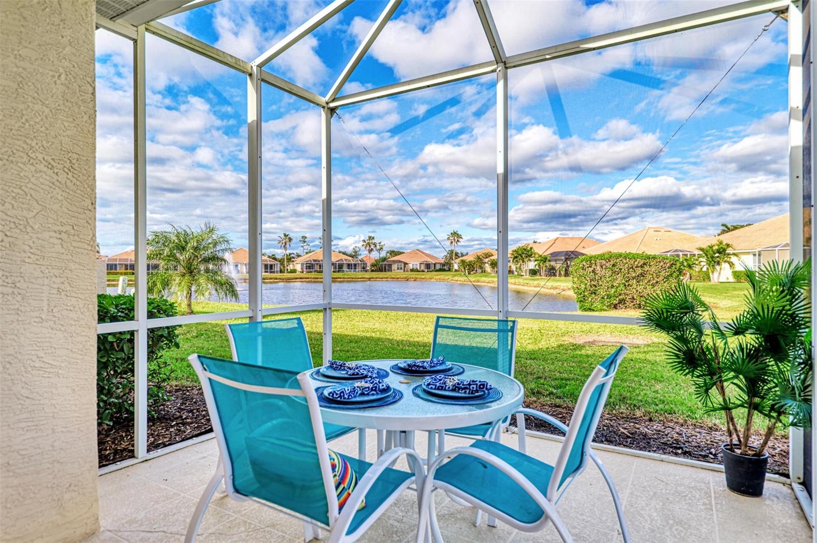 HERON CREEK GOLF & COUNTRY CLUB PAIRED VILLA! Beautiful 2 Bedroom, 2 Bath with a Sparkling Lake View! TURN-KEY FURNISHED! SELLER WILL PAY BUYERS ONE TIME CLUB INITIATION FEE OF $5,000 at Closing!!!! NEW TILE ROOF (2023)! Here's your opportunity to enjoy one of Heron Creek Golf & Country Club's best values while embracing the carefree Florida lifestyle. Smartly furnished with a relaxed coastal flair, this immaculate Westfield-built Key Largo paired villa is perfectly suited for casual Florida living and entertaining alike—and with everything already in place, it's ready for your immediate enjoyment and occupancy. Ideally situated on a premium oversized homesite just a short golf cart ride from the clubhouse and outstanding community amenities, this light-filled split bedroom floor plan features soaring ceilings, classic crown molding, abundant natural light, and an inviting Great Room that flows effortlessly to the extended screened lanai where you'll unwind with peaceful lake views and spectacular Florida sunsets. The bright open-concept kitchen offers abundant light wood cabinetry, an updated glass tile backsplash, new cabinet hardware, two pantry closets, breakfast bar, dinette, and a NATURAL GAS range. The spacious primary suite features a tray ceiling, walk-in closet, dual vanities, and an ensuite bath, while the sunny guest suite enjoys a private full bath and generous closet, creating the perfect retreat for family and friends. An expansive side yard adds a rare sense of openness seldom found in paired villas, and the attached two-car garage provides plenty of room for vehicles, a golf cart, bicycles, and all your Florida toys. Recent improvements include a NEW ROOF (2023), new dishwasher, updated backsplash, and new cabinet hardware, providing true move-in-ready peace of mind. Low quarterly HOA fees include HIGH-SPEED FIBER OPTIC INTERNET, TV SERVICE, lawn care, irrigation, exterior painting, and mulching, making maintenance-free living as effortless as it should be. NO CDD FEES! Heron Creek Golf & Country Club offers an exceptional lifestyle with a spectacular 21,000-square-foot clubhouse, 27 holes of championship Arthur Hills golf, an outstanding Golf Learning Center, resort-style pool and spa, fitness center, Har-Tru tennis courts, a robust social calendar, and both casual and fine dining. Club membership is required with three membership levels beginning at just $284 a month, and with the seller paying the buyer's full $5,000 one-time Club Membership Initiation Fee at closing, you'll have one less expense and one more reason to make your move today. Ideally located near I-75 and US-41 with convenient access to the Cocoa Plum Shopping District, Myakkahatchee Creek Environmental Park, Blue Ridge Park, vibrant Wellen Park,"CoolToday Park" Atlanta Braves Spring Training Stadium, Costco, beautiful Gulf beaches, and the new $507 million** Sarasota Memorial Hospital North Port" campus (now under construction), this pristine villa offers outstanding value, easy Florida living, and an exceptional opportunity to own in one of Southwest Florida's premier gated golf course communities.