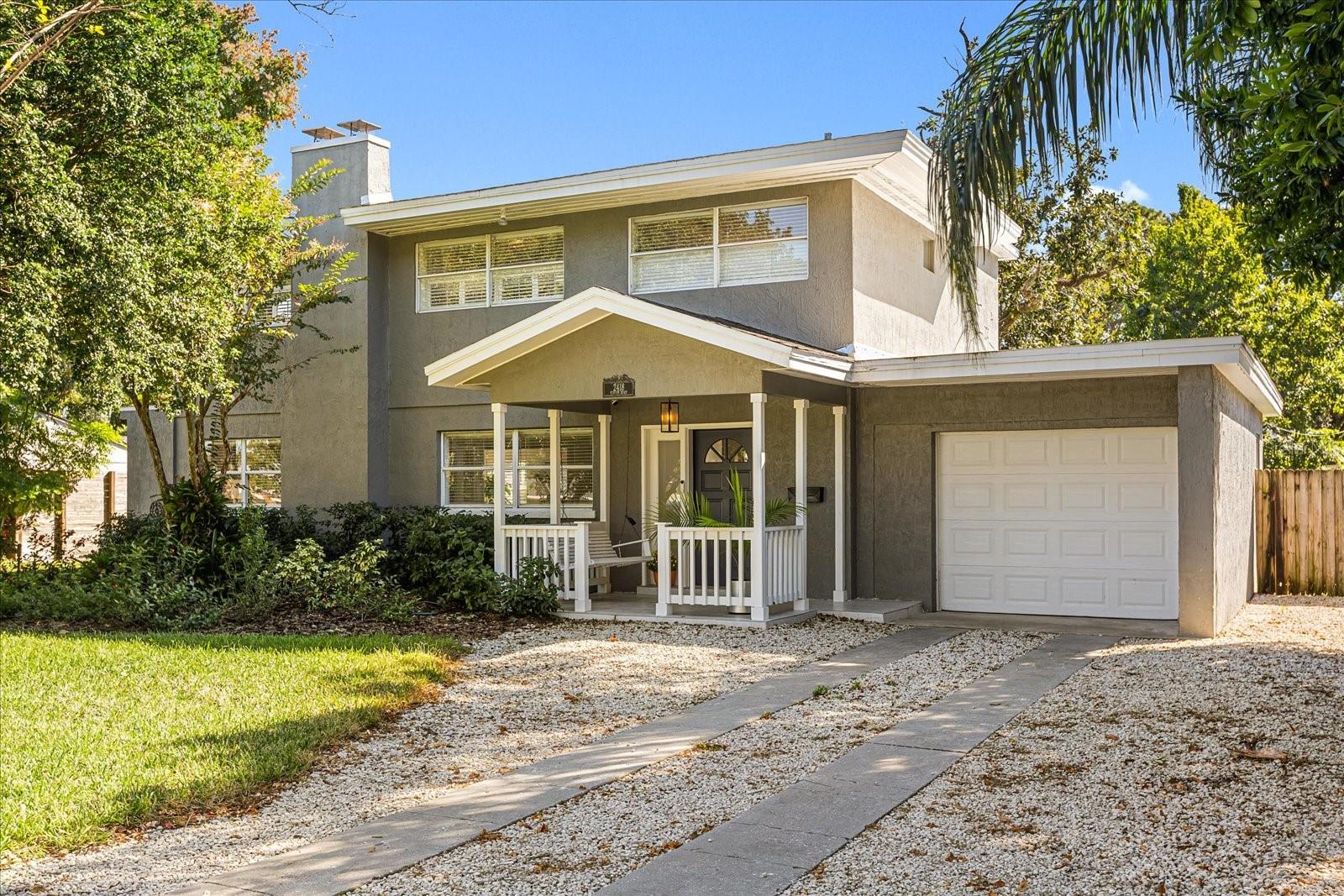 Welcome to this beautifully updated three-bedroom, two-and-a-half-bath home located in the highly sought-after Winter Park 32789 zip code, just moments from scenic Lake Killarney. Situated on an oversized 0.27-acre lot with no HOA, this exceptional property offers endless possibilities, including ample space to add a pool, guest house/ADU, or create the custom outdoor living space of your dreams.

Full of charm and warmth, the home features bright and spacious living areas designed for both everyday comfort and entertaining, highlighted by a cozy wood-burning fireplace. The recently renovated kitchen showcases updated cabinetry, new countertops, newer appliances, and stylish tile flooring throughout the entire first floor. The kitchen flows seamlessly into the breakfast area overlooking the expansive fenced backyard, creating the perfect indoor-outdoor lifestyle.

Upstairs, you’ll find wood flooring throughout the staircase and second floor, along with three light-filled bedrooms, two full bathrooms, and a versatile flex space ideal for a home office, playroom, or study area. Additional upgrades include a renovated downstairs half bath, updated secondary bathroom, professionally cleaned and sanitized AC ducts, new ceiling fans in all bedrooms, a newly installed garage door, a new garage roof, new irrigation system and a main roof replacement completed in 2018.

Relax on the inviting front porch swing and enjoy peaceful lake breezes with your morning coffee or evening glass of wine. Ideally located near Park Avenue, Winter Park Village, premier dining, shopping, entertainment, and major highways with easy access to Downtown Winter Park and Orlando.

Move-in ready and filled with modern updates, timeless character, and unbeatable potential, this property also presents an incredible opportunity to live in while your custom dream home is being built.