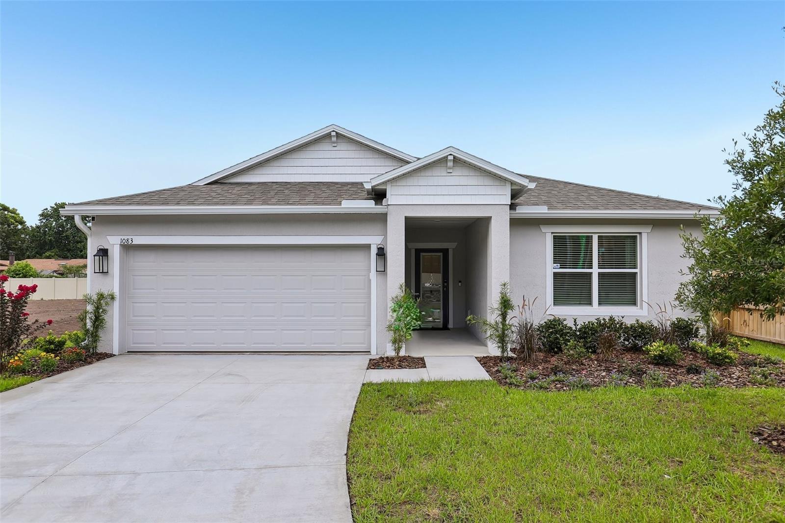 MODEL home offering a sale / leaseback opportunity. Located in the new Cassie Oaks community, with just 24 homesites on a charming cul-de-sac street, this move-in ready Maple showcases an impressive collection of sleek upgrades, quality construction, and modern finishes throughout. Built with durable block construction, the community has no CDD fees, a low $95 monthly HOA, and rear privacy fencing throughout. 
Step inside the Maple floor plan through the striking 6 foot 8 inch glass front door into a bright, open concept layout where the great room, enhanced with additional LED lighting, flows seamlessly into the kitchen. Granite countertops, white soft-close cabinetry, a subway tile backsplash, and a full suite of stainless steel appliances, including an ESTAR refrigerator and dishwasher, create a space that is both beautiful and functional. Just beyond, a spacious flex room provides endless possibilities as a home office, fitness room, media room, or formal dining area.
Situated at the rear of the home, the primary suite features a generous walk in closet and an elegant bath with dual granite vanities, white cabinetry, and an oversized tiled shower with a glass enclosure. Three secondary bedrooms are thoughtfully positioned on the same side of the home, including one with its own walk in closet. A convenient walk through laundry room, complete with a washer and dryer, provides direct access to the two car garage.
A large screened patio extends the living space outdoors, creating an inviting setting to relax or entertain. This home is fully enclosed with privacy fencing for even greater seclusion. Additional highlights include blinds throughout, a Ring Video Doorbell, Smart Thermostat, Keyless Entry Smart Door Lock, and durable three tab shingles for added value. Cassie Oaks  is located 20 minutes/14 miles from NAS JAX, 15 minutes/8-9 miles from Ascension St. Vincent's Riverside, Wolfson's Children's Hospital, and Baptist Medical Center-Jacksonville. And just 1 mile from Trinity College of Jacksonville. Full builder warranty.