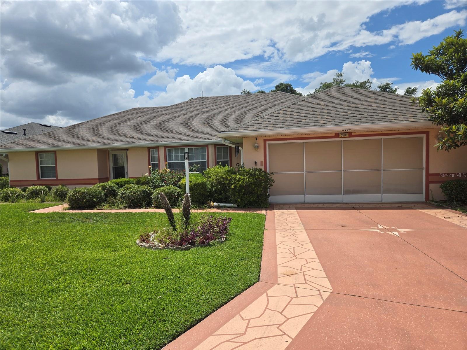 Move in Ready!!! POOL home with an over-sized 2 car garage with space for a golf cart and more! The front door opens to a spacious living area with formal dining space and includes laminate wood floors throughout the home. The dining space has sliding doors out to the screened pool enclosure and covered porch. The saline, HEATED swimming pool is 12 x 30 sq. ft. and has a hot tub with waterfall feature. Privacy hedges surround pool and patio, with plenty of green space between homes. The kitchen is upgraded with granite counter tops, stainless appliances, closet pantry, and gas stove. The kitchen nook also opens with sliding doors to the porch and pool. A huge master bedroom includes two large walk-in closets, with master bath offering dual sinks, corner tub, and separate shower. The guest bedrooms are conveniently located on the other side of the home, with one of guest rooms also having sliding doors to porch and pool area. The inside utility room has counter space and lots of cabinets for convenience. Other features include Newer A/C & HEATING, OVER-SIZED TWO CAR GARAGE WITH GOLF CART SPACE. FURNITURE. Located in Royal Highlands resort style golf community, with 24/7 security guard/gate, indoor and outdoor swimming pools, walking and bike paths through shady Florida landscape, 18-hole championship golf course, Pickleball courts, fitness center.