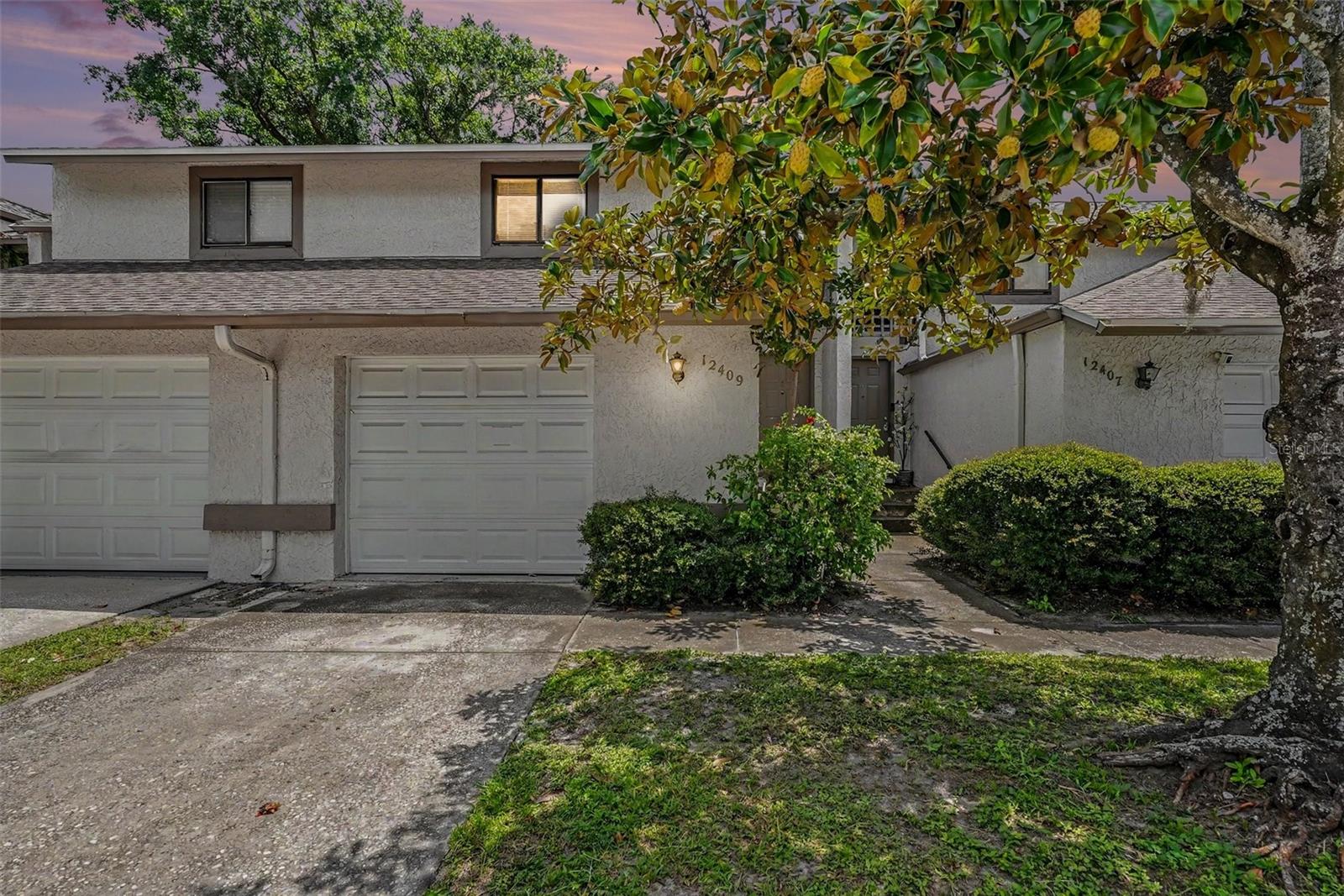 Welcome to 12409 Titus Ct in the desirable Carlyle Garden Townhomes community of Tampa! This beautifully updated 2-bedroom, 1.5-bath townhome offers a bright, inviting interior with modern finishes and a functional layout designed for comfortable living.The spacious main living area features abundant natural light, neutral finishes, and a cozy fireplace that creates a warm and welcoming atmosphere. The newly renovated kitchen showcases granite countertops, updated cabinetry, stainless steel appliances, and ample prep space, making it ideal for both everyday living and entertaining. Sliding glass doors open to a private outdoor patio, providing the perfect spot to relax or enjoy your morning coffee.The first floor also features a newly renovated half bath conveniently located off of the main living area, perfect for guests. Upstairs, you'll find two generously sized bedrooms and a remodeled full bathroom. All the recent updates give this home a fresh, inviting, move-in-ready feel.Located in an established community, this property offers convenient access to shopping, dining, major highways, and everything the Tampa area has to offer. Whether you're a first-time homebuyer, looking to downsize, or seeking an excellent investment opportunity, this townhome is one you won't want to miss.