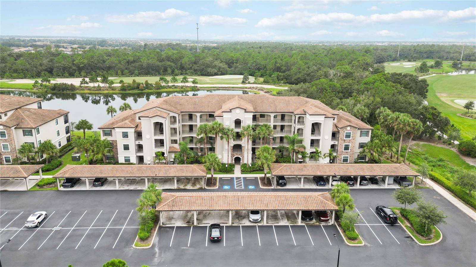 Beautiful Lakewood National Championship Golf Community Terrance Condo on the 3rd Floor with a beautiful Golf and Lake View! Turnkey furnished as it is shown in the image. The condo was used as a vacation home and barely lived in. From the morning room or your private balcony, you will be looking at a beautiful lake plus the golf course; an open floor plan in the living area, combined with the gathering room, morning room, open kitchen, and formal dining room. A spacious storage room for this unit is located by the elevator. Each unit has an assigned covered parking, and there is plenty of guest parking in front of the building. The washer and Dryer are inside the unit. Beautiful crown moldings all around the unit. The master room suite is at the front of the unit where a second bedroom and bathroom are across the hallway divided by the entrance for their own privacy. Full golf membership is included. The community includes a 24-hour security guard, the clubhouse includes a resort-style pool, Fabulous amenities include 36 holes of Arnold Palmer-designed golf course, a heated pool with a cascading waterfall and lap lanes, a poolside tiki bar and café, a fitness center with group exercise classes, an on-site full-service spa, eight lighted Har-Tru tennis courts, bocce, pickleball, several satellite pools and more. A brand new 28,000-square-foot clubhouse is opening this spring, offering an additional patio, private, and fine dining, a conference/event space, a ladies and men’s locker room/lounge area, and more. THIS IS ONE OF THE FEW COMMUNITIES THAT CAN BE LEASED 12 X PER YEAR ON A MONTH-TO-MONTH BASIS MAKING IT A LUCRATIVE INVESTOR OPPORTUNITY. Lakewood Ranch has been ranked the No.1 community in the U.S. and offers world-class shopping, fine dining, arts and entertainment. Easy access to I-75, A-rated schools, near world-class beaches and the attractions of Sarasota, Bradenton, and Tampa.