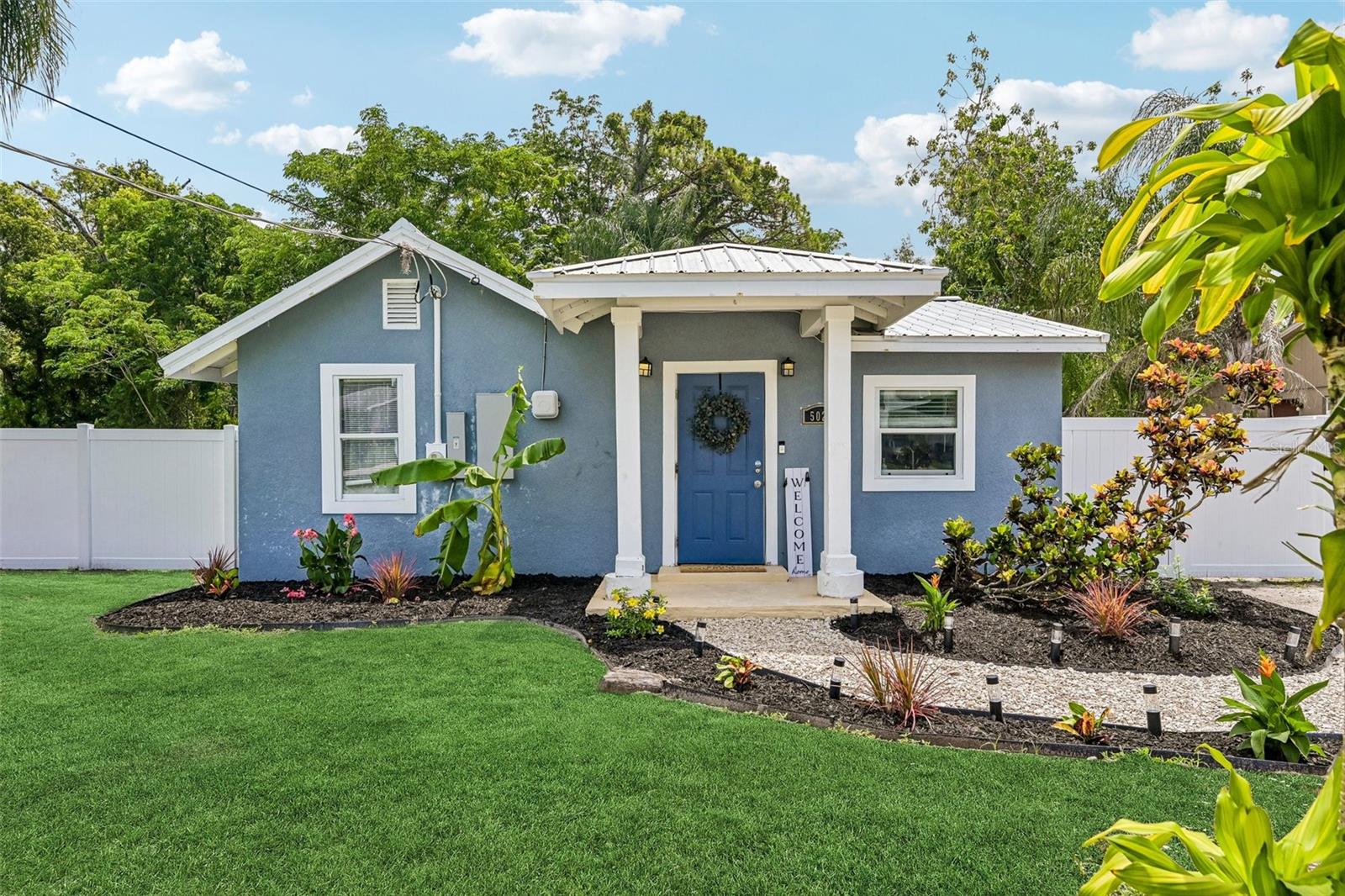 Welcome to this rare and beautifully renovated 1921 Oneco Gardens bungalow in Bradenton! Blending timeless historic charm with modern updates, this inviting three-bedroom, two-bath home offers comfortable Florida living with a move-in-ready feel.
Step inside to an open-concept floor plan featuring modern wood-look tile flooring, neutral gray paint, and recessed lighting throughout. The spacious living and dining areas flow seamlessly into the renovated kitchen, complete with shaker-style cabinetry, granite countertops, and stainless-steel appliances. A large pass-through window connects the kitchen to the dining area and could easily be transformed into a convenient breakfast bar.
Both bathrooms have been thoughtfully updated with modern finishes. A separate interior laundry area with washer and dryer is conveniently located just off the kitchen.
Step outside to enjoy Florida's beautiful weather from the paver deck overlooking the oversized, fully fenced lot. With plenty of room for a pool, plus a large detached shed ideal for a workshop, hobby space, or additional storage, the outdoor possibilities are endless. Additional features include a durable metal roof and NO HOA!
Conveniently located just minutes from US-41 and Manatee Technical College, with easy access to waterfront dining, boating, fishing, and the beautiful Gulf beaches of Anna Maria Island and Holmes Beach. Come experience the best of Southwest Florida living and make this charming bungalow your new address!