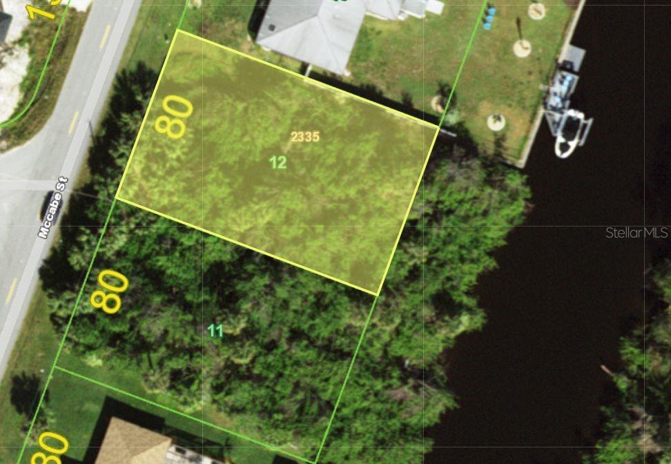 Build your Florida dream on this oversized waterfront homesite in the growing community of Port Charlotte! Offering approximately 80 feet of frontage, this vacant lot provides a great opportunity to design and build the home you’ve been envisioning with room to create your ideal outdoor living space. Enjoy a peaceful setting with nearby waterways, established homes, and convenient access to shopping, dining, golf, beaches, and everything Southwest Florida has to offer. Bonus opportunity: the identical adjacent lot is also available for purchase, creating the potential to secure additional space, expand your vision, or invest side-by-side. Don’t miss your chance to own one—or both!