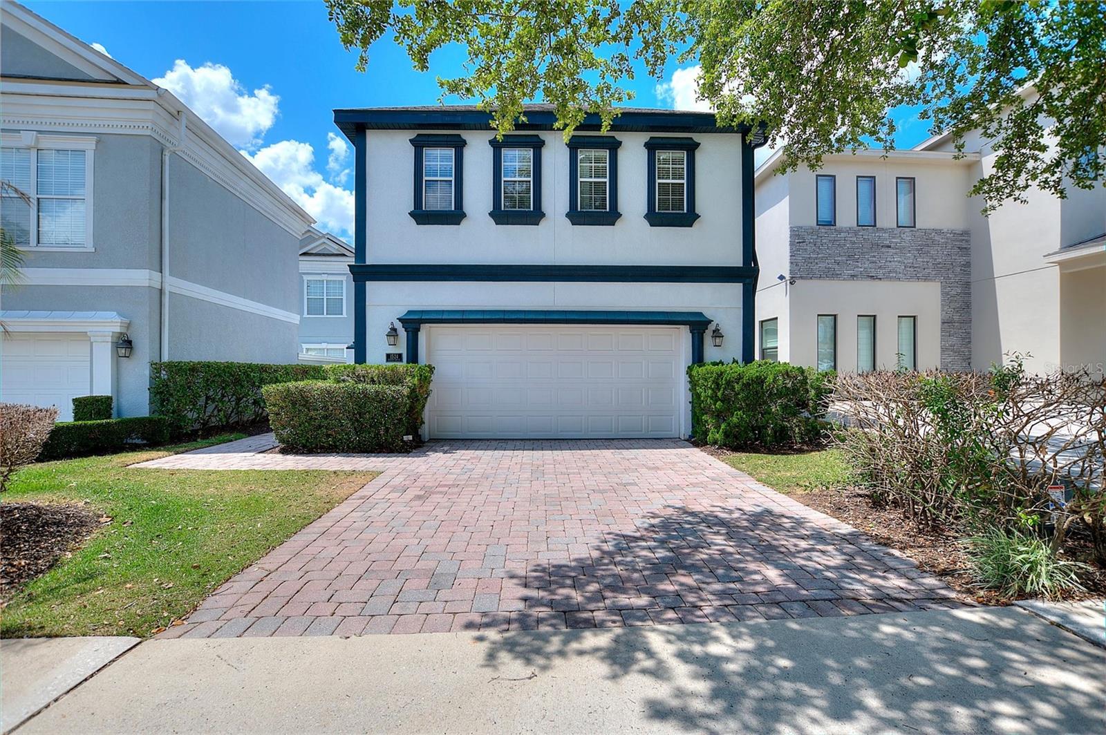 Welcome to this exceptional golf-front estate overlooking the 6th fairway and green of the Arnold Palmer Signature Course in Reunion. Offering nearly 3,800 square feet of living space, this unique three-story residence combines luxury, flexibility, and outstanding rental potential in one of Central Florida's most sought-after resort communities.

Featuring five bedrooms, five-and-a-half baths, a private elevator, private pool and spa, and multiple balconies with panoramic golf course views, this home was designed for both entertaining and comfortable resort-style living.

One of the property's most desirable features is the detached guest house overlooking the pool area. Complete with its own private bedroom and bath, this separate retreat offers ideal accommodations for extended family, visiting guests, or additional rental flexibility while maintaining privacy from the main residence.

Inside the main home, spacious living and dining areas flow seamlessly to the outdoor entertainment space. The second-floor primary suite features a private balcony with breathtaking views of the 6th green, creating the perfect setting for morning coffee or evening relaxation.

The third-floor entertainment level serves as a destination of its own, featuring a game room, wet bar, media space, and an expansive balcony overlooking the golf course. From this elevated vantage point, enjoy stunning sunsets, beautiful fairway views, and Disney fireworks in the distance.

Outside, the private pool and spa create a true resort atmosphere, surrounded by mature landscaping and picturesque golf course scenery. Whether hosting family gatherings, entertaining guests, or maximizing vacation rental income, the home's thoughtful design provides exceptional versatility.

Located just minutes from Walt Disney World, world-class dining, shopping, and entertainment, this remarkable golf-front property presents a rare opportunity to own one of Reunion's most distinctive homes.