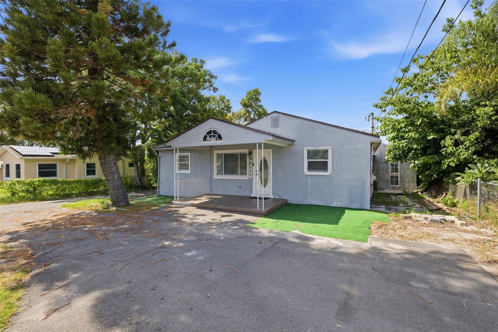 Excellent Investment Opportunity Near Busch Gardens!
Ideally situated close to major attractions, including Busch Gardens and Adventure Island, this property also offers convenient access to hospitals, schools, shopping, dining, Tampa International Airport, and some of Florida's most beautiful Gulf Coast beaches.
The property includes two separate residences, creating excellent income-producing potential. Live in one home while renting the other, or maximize returns by leasing both.
The main residence offers 3 bedrooms and 2 bathrooms, along with a comfortable living area, kitchen, bonus room, and durable laminate flooring throughout. A private fenced patio provides additional outdoor living space. 
The second home, located at the rear of the property, features a spacious living room, kitchen, 2 bedrooms, a large bathroom, and tile flooring throughout. It also includes its own fenced yard, providing added privacy for occupants.
Both homes share access to an exterior utility room equipped with a washer and dryer.
Whether you're looking for a multi-generational living arrangement, a dual-rental investment, or a home with supplemental income potential, this unique property offers outstanding flexibility and value.
Schedule your private showing today!