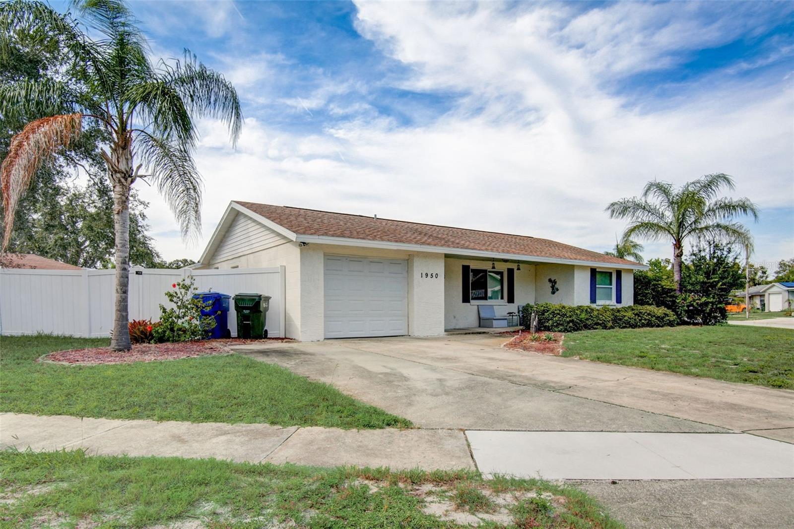 Don't miss this opportunity to own this lovely 3 bedroom, 2 bathroom home in Ridge Park Estates. This home features a spacious living room, split plan bedrooms and an oversized 1 car garage. The kitchen has granite countertops and plenty of cabinet space. The master bedroom has an ensuite bathroom with a walk-in shower and a walk-in closet. The backyard is fenced and has a pool and a patio for outdoor fun. This home is conveniently located close to shopping, dining, and entertainment options. You will love living in this beautiful neighborhood with easy access to the beach, Taylor Park, and the Pinellas Trail. Some of the recent updates includes a new plumbing throughout and a new pool pump in 2021. This home is move-in ready and waiting for you to make it your own. Schedule a showing today and see for yourself what this home has to offer!