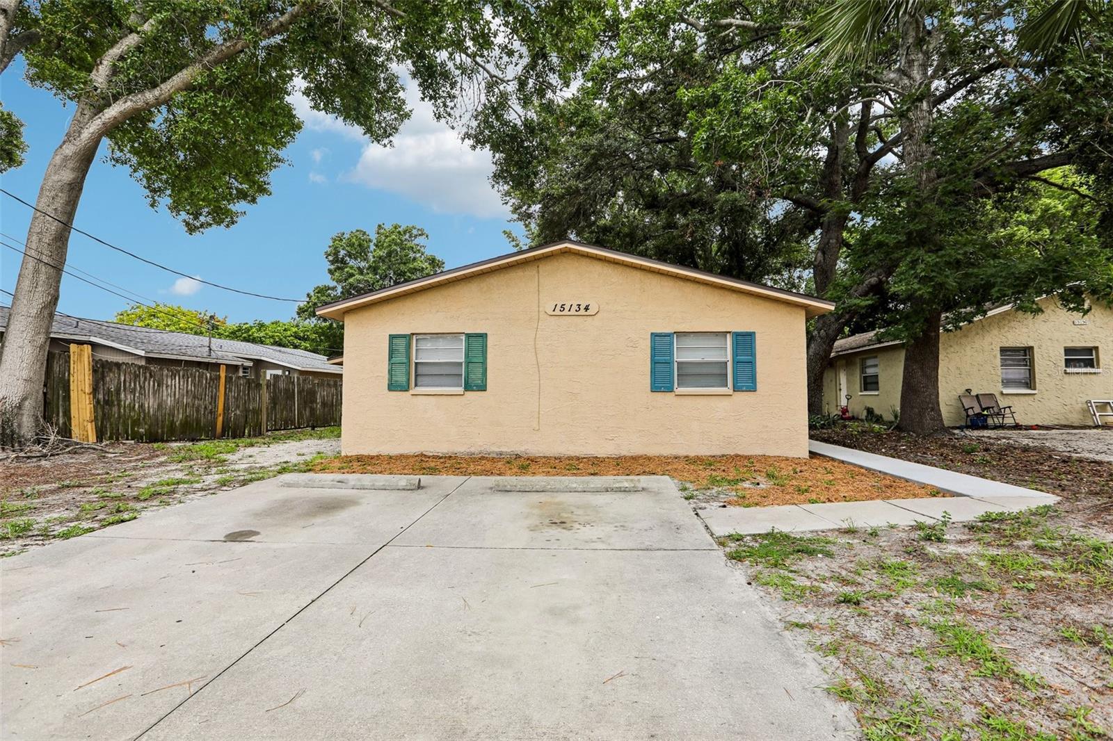 Welcome to 15134 Verona Ave, Clearwater, FL 33760—a well-maintained duplex offering exceptional income-producing potential and strong value for investors or owner-occupants alike. This versatile property has been thoughtfully updated and features major capital improvements that provide peace of mind while helping minimize future maintenance expenses. Unit A serves as a true **model unit**, showcasing a fully renovated interior with an updated kitchen, beautifully remodeled bathroom, fresh paint, and modern ceiling fans throughout. Unit B has also been improved with a **newly renovated bathroom**, enhancing both comfort and rental appeal. Adding to the property's functionality, **each unit features its own private laundry room and dedicated storage area**, a highly desirable amenity for tenants. Significant updates include a **new roof installed in 2021**, a **new A/C system in Unit B in 2023**, and a **new A/C system in Unit A in 2025**, giving buyers confidence in the property's major systems. Whether you're looking to expand your investment portfolio, generate consistent rental income, or live in one unit while renting the other, this property presents an outstanding opportunity. With its desirable Clearwater location, attractive updates, and tenant-friendly features, 15134 Verona Ave offers **excellent rental income potential** and long-term investment value. Don't miss your chance to own a turnkey property that combines modern upgrades, strong cash-flow potential, and investment upside in the heart of Pinellas County. Schedule your private showing today!