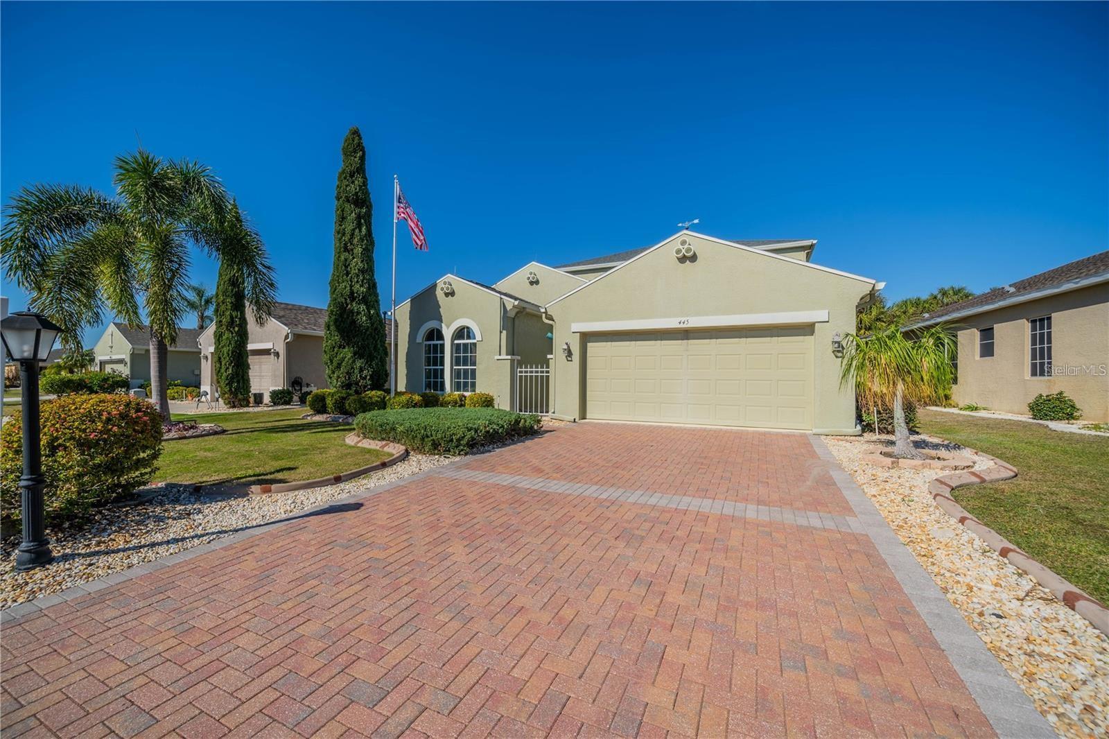 Virtually Staged. VERY IMPRESSIVE HOME located on the 5th green of the Renaissance Club golf course, offering elegant, low-maintenance living in one of Sun City Center’s most desirable neighborhoods. This beautifully upgraded residence features three bedrooms plus a den, providing flexibility, comfort, and exceptional views. The CHEF'S KITCHEN is the heart of the home, showcasing an abundance of 42" WOOD CABINETRY, NATURAL GAS cooking, stainless steel appliances, GRANITE countertops with backsplash, dual stainless sink, and reverse osmosis system under the kitchen sink. The adjacent dinette overlooks the golf course and opens to the lanai, ideal for everyday living and entertaining. The spacious living area offers soaring ceilings, PLANTATION SHUTTERS, remote-controlled blinds, tile flooring, surround sound, and expansive golf course views, with sliding doors leading to the lanai. Both lanais are climate-controlled for year-round enjoyment. The primary suite is a relaxing retreat featuring a remodeled en-suite bathroom with dual sinks, a large walk-in shower with dual shower heads, two walk-in closets, a tray ceiling, and handicap-accessible features. A private guest suite and a den with upgraded stained-glass French doors—ideal as a home office or additional bedroom—complete the main level. All bathrooms feature granite countertops. A standout feature is the private SECOND FLOOR SUITE with walk-in closet, chair lift, and its own lanai overlooking the golf course—perfect for extended guests, caregivers, or flexible use as a media room, hobby space, or fitness area. Additional highlights include abundant storage throughout, including space under the staircase, a laundry room with sink and storage, and a two-car garage with Gladiator steel cabinets. The home is equipped with an automatic natural gas WHOLE HOUSE GENERATOR and HURRICANE IMPACT WINDOWS for added peace of mind. Curb appeal is enhanced by a brick paver driveway and walkway, decorative concrete landscape curbing, mature landscaping, a newer irrigation system, and a lighted flagpole. Sun City Center is a premier golf cart–friendly active retirement community offering an unmatched lifestyle filled with amenities, activities, and convenience. Residents enjoy multiple golf courses, indoor and outdoor swimming pools, fitness centers, walking and biking paths, and an impressive variety of clubs and social activities including pickleball, tennis, softball, arts and crafts, and more. Ideally located just off Interstate 75, Sun City Center sits perfectly between Tampa and Sarasota, providing easy access to world-class beaches, shopping, dining, professional sporting events, cultural attractions, and major medical facilities. Several international airports, cruise ports, and popular Florida attractions are all within an easy drive, making travel and entertainment effortless. With year-round sunshine, endless recreational opportunities, and a vibrant social atmosphere, Sun City Center offers the ideal blend of active living, convenience, and Florida lifestyle.
