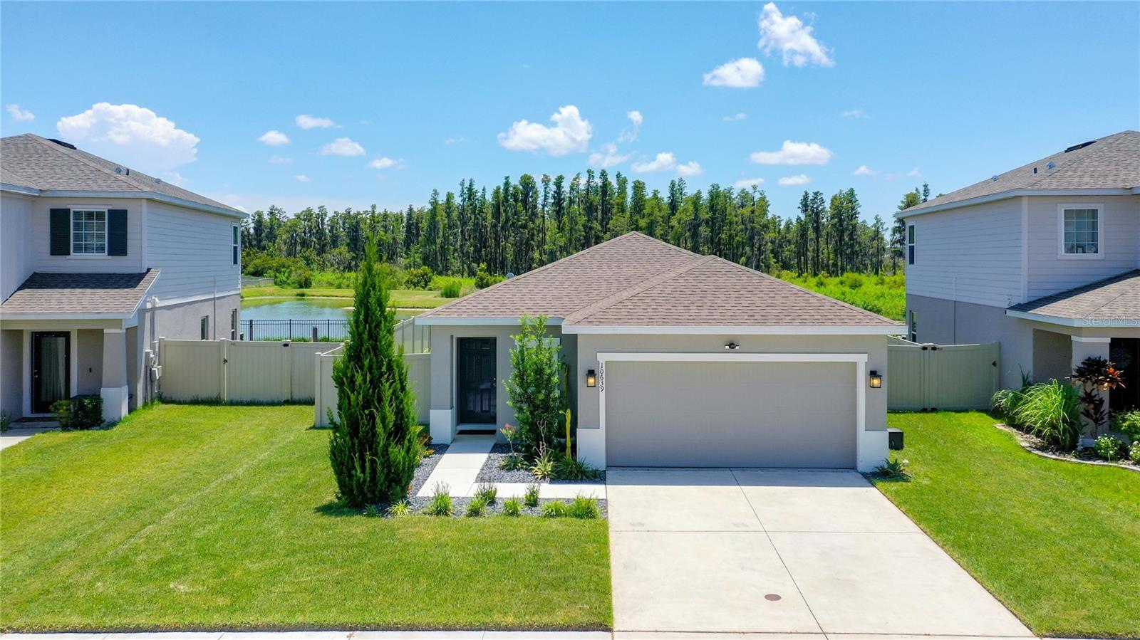 You can tell pride is ownership abounds in this newly available rental in Cypress Preserve.  Welcome home to your turn key 3 bedroom 2 bath split, open floor plan.  The kitchen boasts solid dove grey wood cabinets & granite countertops, SS appliances, & recessed lighting.   The lot is oversized & fenced in.  The tranquility of the pond can be enjoyed from the custom designed pergola in the backyard.  Come back inside after watching the sunset & grab the remote control to adjust how much light you want the shade to let in.  Dogs are welcome, but are breed restricted.  And responsible pet parenting is expected in this community.  Speaking of community, Cypress Preserve does not disappoint. Amenities include a zero entry pool, cabana, playground, off-leash dog park, & walking trails.  It is within minutes of the Suncoast Parkway & provides an easy commute to work, shopping, restaurants, & urban points of interest throughout Tampa Bay.  Lawn spraying is being provided by the owners.