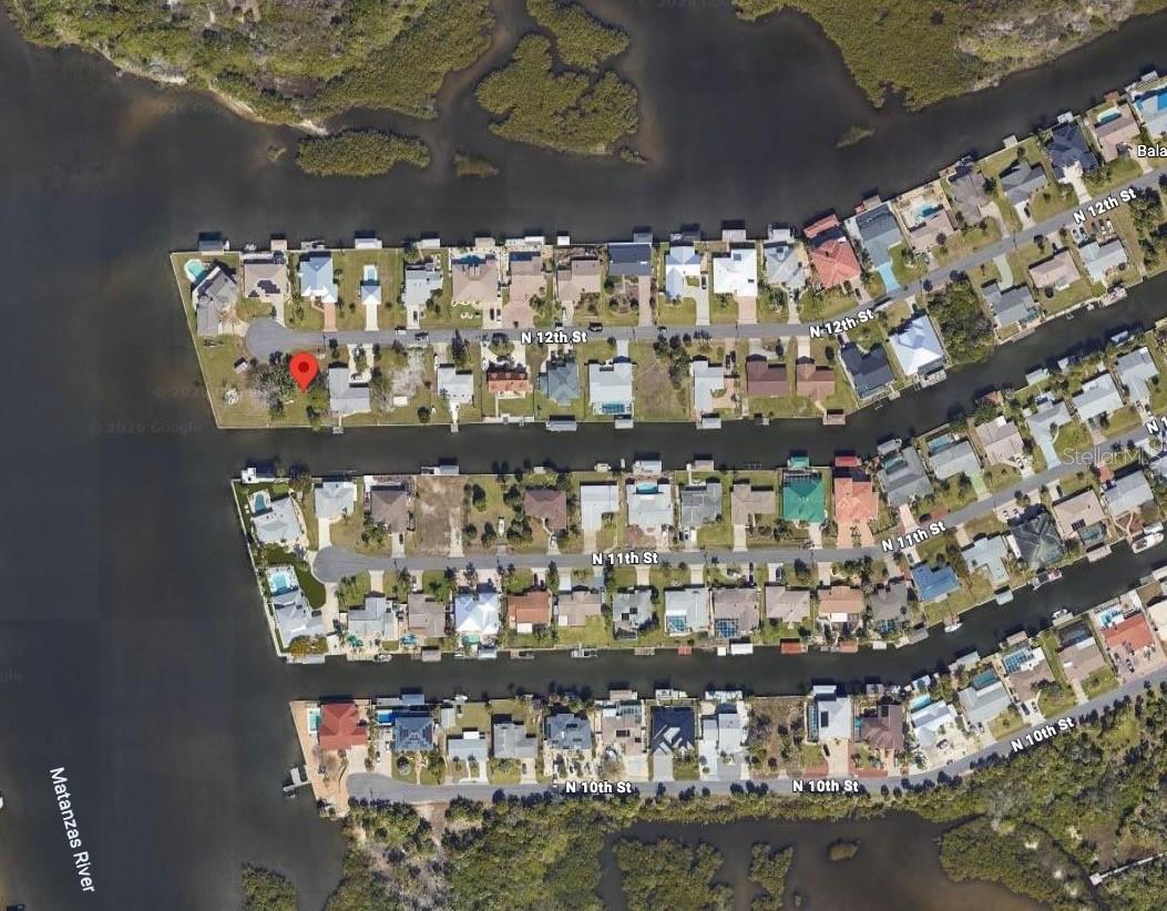 Own a piece of the Flagler Beach barrier island at 339 North 12th Street, a homesite a few blocks from the Atlantic in Flagler Beach, Florida. The parcel is level and cleared and has utility plumbed from a previous home that was constructed there.  It has no HOA, no CDD, and no clock forcing you to build. Build a custom single family home with space for a pool, detached garage, and screened lanai. City water and sewer [available at the street]. North 12th Street is an established street of single family homes on a barrier island protected by a 35 foot building height limit, which is why Flagler Beach still looks like Florida did before the towers went up. Bike to the Flagler Beach Pier, Veterans Park, and the oceanfront restaurants along A1A, then cross the bridge to Intracoastal boat ramps and the Betty Steflik Preserve. Bring your builder and stake your claim in Flagler Beach.