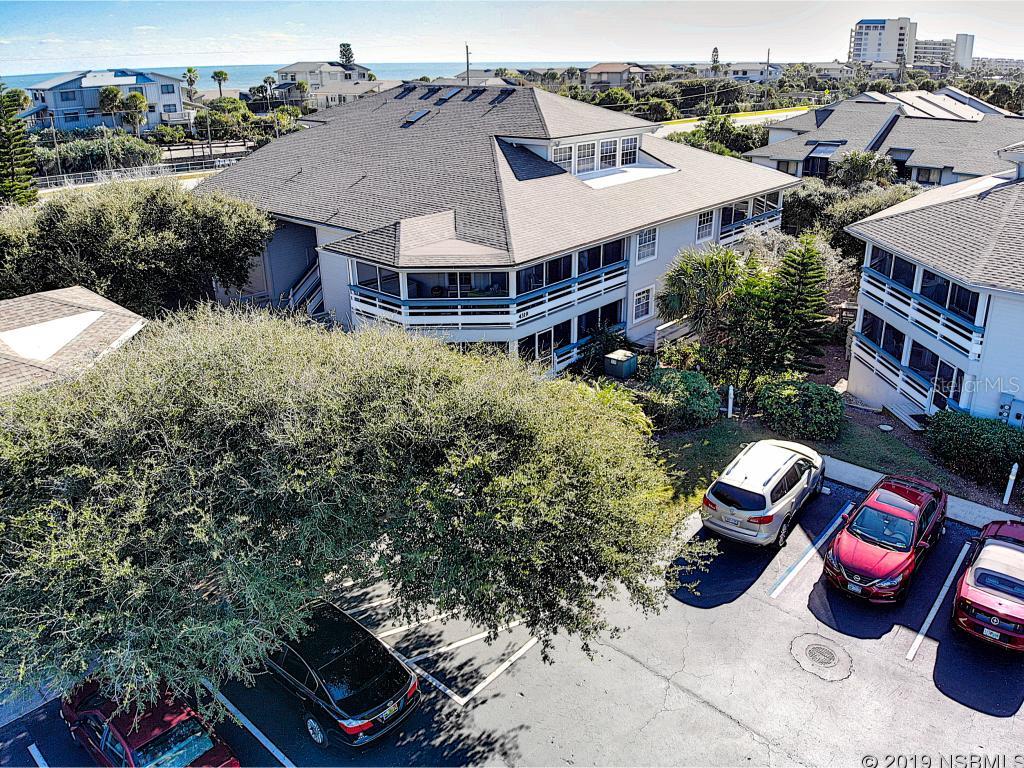 Furnished ground floor 2 bedroom 2 bath condo now available in desirable Seawoods Verandas. This beautiful turnkey unit has all new kitchen appliances, custom blinds, newer carpet and recently painted. Also has rental income on the books. What makes this unit very attractive is the massive balcony for your bikes, beach toys, paddle boards, outside seating or whatever you like. Just steps from your car to your unit. Located across the street from the no drive beach, Seawoods is unique beachside community located amongst 50 acres of trees with swimming pools, tennis courts and walking trails.This unit won't last. Start living the lifestyle like the locals do in New Smyrna Beach! ;LocationDescription: Condo ;Water: City