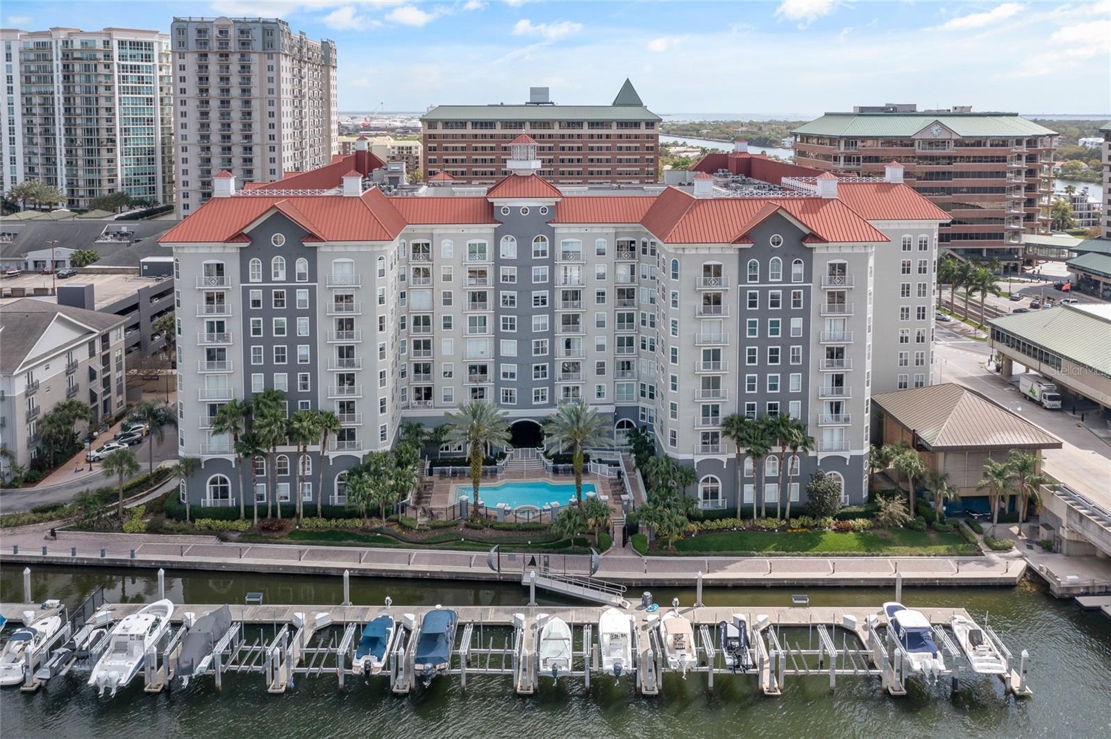 LOCATION - WATER & CITY VIEWS - AMENITIES - Parkcrest Harbour Island - Beautiful 2 Bedroom / 2 Bath Condo Located within WALKING Distance to TGH, Benchmark International Arena, The Riverwalk, Downtown Tampa, Bayshore Boulevard, Sparkmans Wharf, ETC .... Experience Life in the Downtown Core while living in this Meticulously Maintained Condo with Neutral Carpet and Paint throughout - The Kitchen includes Stainless Steel Appliances, Granite Countertops, Updated Lighting, and an Abundance of Cabinetry - The Master Bedroom Includes an Oversized Walk-In Closet and an En Suite Bath - In addition, there is also a Designated Laundry Room and Abundant Storage - ALL within a Resort-Like Setting with a Waterfront Swimming Pool and Spa, Fitness Center, Billiard Room, Entertainment Room that Includes a Large TV and Bar - On Site Manager, Concierge and 24/7 Security .....