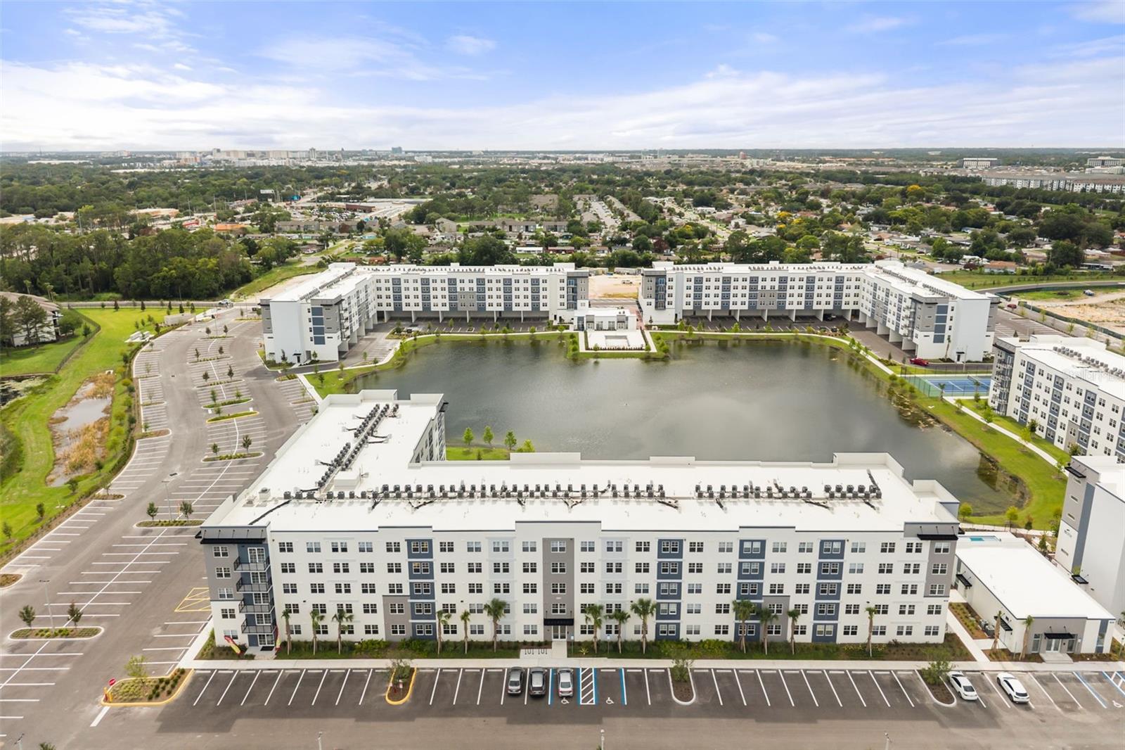 One or more photo(s) has been virtually staged. Welcome to elevated living in the heart of Orlando. This 2 bedrooms + den, 2 baths residence on the 3rd floor offers serene nature views and the perfect blend of comfort and convenience. With elevator access and an open, flexible den (ideal as a home office, guest room, or creative space). Just 2 miles from The Mall at Millenia and only 20 minutes from Orlando International Airport, you’re perfectly positioned to enjoy everything the city has, including over 25,000 sq ft of retail space (developing). The resort style amenities are truly unmatched. Stay active with a fully equipped indoor fitness center overlooking the pool, enjoy tennis courts, lakeside Park waterfront trail, playground and enclosed dog park.
Your peace of mind is a priority, with a community security system and cameras keeping residents safe around the clock. This is more than an apartment, it’s a lifestyle. Schedule your private tour today.