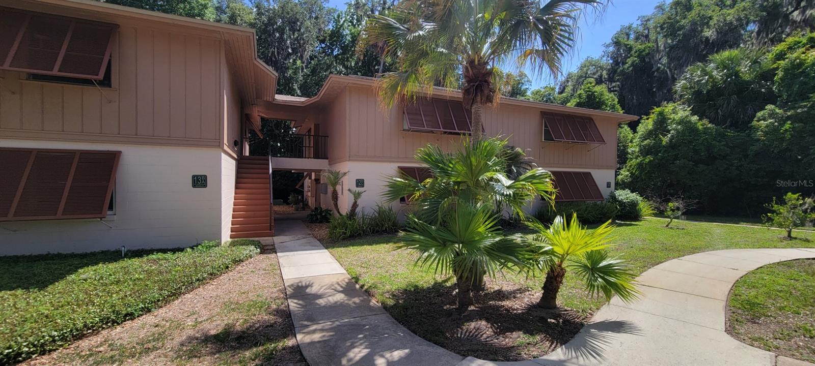 GREAT LOCATION, CERAMIC TILE THRU-OUT ENTIRE UNIT, CEILING FANS, WOOD KITCHENMAID CABINETS TO CEILING, FULL LAZY SUSAN CORNER CABINET, EXTRA LARGE CABINET NEXT TO RANGE, NEWER COUNTERTOPS, ENCLOSED GLASS WINDOWS ON PORCH WITH CUSTOM STORAGE CABINET, MASTER BATHROOM WALK IN SHOWER, UPDATED VANITIES IN BATHROOM WITH CUSTOM CABINETS, CUSTOM CLOSETS BOTH BEDROOMS, IN FOYER CUSTOM PANTTRY CLOSET, CEILING FANS THRU-OUT. CLOSE TO I-4 EXIT 108, CLOSE TO PARKS WITH PLAYGROUNDS. BIKE TRAIL CLOSE BY. OWNER MOTIVATED TO SELL!