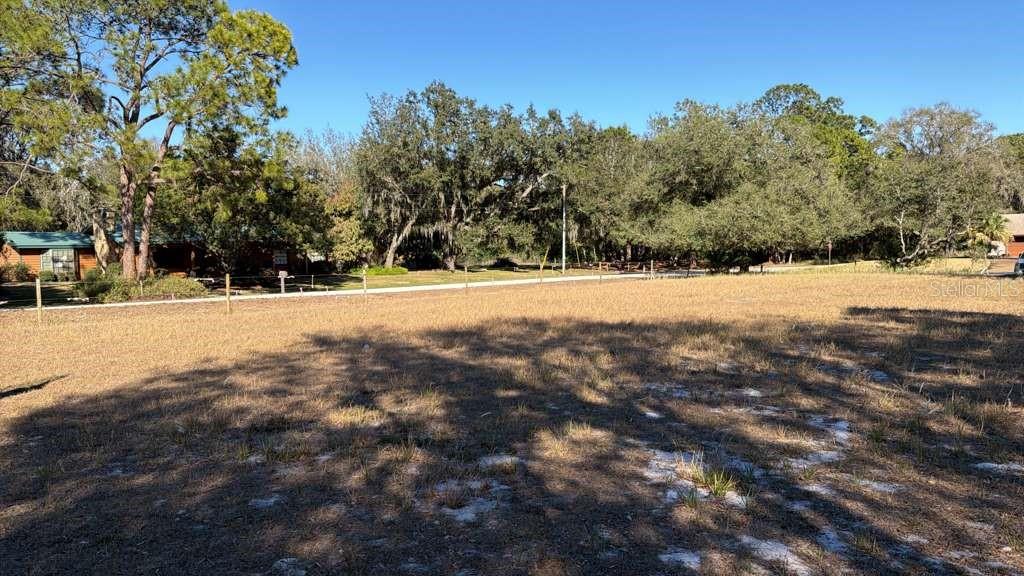 NO HOA! NO CDD! CLEARED 0.65 ACRES OF LAND ON A CORNER LOT, READY TO BUILD! Welcome to 2328 N West Shore Dr in Avon Park, a rare opportunity to own land in Highlands County with no HOA and no CDD fees, plus creek access to running water. This cleared, buildable corner lot of vacant land offers approximately 123 feet of road frontage, making it truly ready for your dream home or next investment. Perfect for a custom build or investment property, this spacious lot allows the freedom to enjoy multiple vehicles, recreational toys, outdoor storage, and future expansion. With no HOA or CDD restrictions, you can build and use the property on your terms. Located in a growing area of Avon Park, this property offers peaceful surroundings while remaining convenient to shopping, dining, and major roadways. Build now or hold for the future...the possibilities are wide open. 0% DOWN PAYMENT ELIGIBLE THROUGH USDA FINANCING. Seller financing and private financing available. Do not wait, it will not last long!