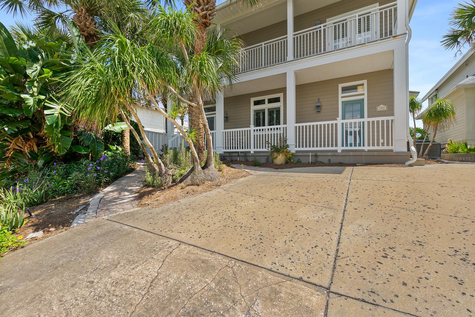 This gorgeous, 4 bedroom, 3 bath, direct oceanfront home looks like something from the pages of Southern Living Magazine. You will love the casual elegance, beautiful views of the beach, open living spaces, lots of natural light, private walkway to the beach and beckoning sunning deck and covered porches. This gorgeous home has 10 ft ceilings, living room and dining room with built in features, gas fireplace, a large kitchen with custom cabinets and double ovens, tankless gas water heater, Trex decking, Plantation shutters and newer doors and windows. Third Floor features enclosed lookout. Extra parking at street. Centrally located and close to Flagler Ave, shopping and restaurants. Zoned for short term rentals with rental history. If you've been searching for the perfect beach home you've found it now. ;Water: City