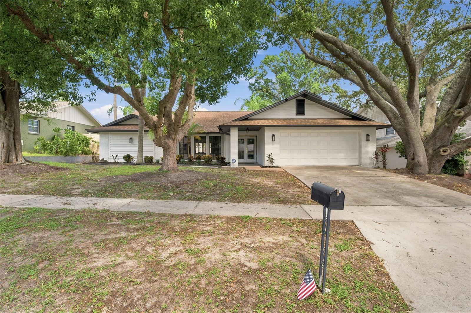 From the moment you step inside, you'll be impressed by the incredible sense of space and natural light throughout this beautifully maintained 3-bedroom, 2-bath home in the heart of Valrico. Massive vaulted ceilings soar above the living and dining rooms, creating an open, airy feel, while the expansive kitchen offers an abundance of custom cabinetry, quartz countertops, stainless steel appliances, recessed lighting, a stylish backsplash and generous prep space. The kitchen flows seamlessly into the spacious family room, where a cozy fireplace and sliding glass doors open to a covered lanai overlooking the screen-enclosed pool and spa, perfect for relaxing or entertaining year-round! The private primary suite features a walk-in closet and an en-suite bath with a large soaking tub and separate walk-in shower. Additional highlights include an inside laundry room, a 2-car garage, a fenced backyard and the peace of mind of being located in a non-flood zone. Conveniently situated near the scenic trails and recreation at Lithia Springs Park, the shopping and dining of Brandon Town Center, Bloomingdale Golfers Club, and with easy access to downtown Tampa, Gulf Coast beaches, and major highways, this home offers the perfect blend of comfort and convenience. Don't miss your opportunity to make this exceptional home your own, schedule your private showing today!