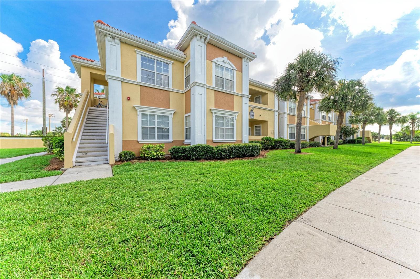 Virtually Staged. Move-In Ready 3BR/2BA Condo in Villagio – Welcome to maintenance-free, resort-style living in the heart of Sarasota! This beautifully updated 3-bedroom, 2-bath condo in the sought-after gated community of Villagio offers comfort, style, and an unbeatable location just 10 minutes from vibrant downtown Sarasota. Step inside to find luxury vinyl plank flooring throughout, an open-concept living and dining area, and abundant natural light. The kitchen features updated stainless steel appliances and generous cabinet space, flowing seamlessly into the main living areas — perfect for entertaining. The spacious primary suite is a true retreat, complete with a walk-in closet and a private nook ideal for a home office, with sliders opening directly to your own patio. Both bathrooms have been tastefully updated with modern finishes. A large indoor laundry room adds everyday convenience, and two covered parking spaces are included. Major-system peace of mind comes standard: new water heater (2026), AC (2022) with a 10-year warranty, new roof (2021), and fresh exterior paint (2024). Living in Villagio means enjoying a wealth of resort-style amenities, including a heated community pool, clubhouse, fitness center, tennis court, putting green, picnic area, dog park, and playground — all maintained for you. The location simply can't be beat. You're directly across from Ed Smith Stadium (spring training home of the Baltimore Orioles), enjoy a private community entrance to Tuttle Elementary, and are minutes from downtown Sarasota's dining, shopping, arts, and world-famous Gulf Coast beaches. Don't miss this rare opportunity to own a turnkey condo in one of Sarasota's most convenient and amenity-rich communities. Schedule your private showing today!