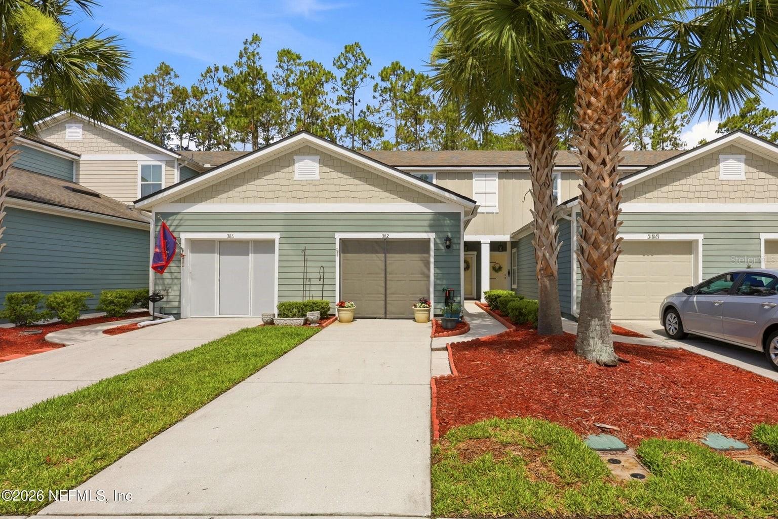 Beautifully maintained townhome in the desirable Palisades at Durbin Crossing! Enjoy low-maintenance living with access to Durbin Crossing's resort-style amenities, including multiple pools, fitness centers, clubhouse, tennis courts, basketball courts, playgrounds, and walking trails. This home features updated countertops and flooring, along with an open-concept layout, spacious living areas, and a modern kitchen designed for everyday living. Step outside to a private outdoor space with preserve views and a retractable awning--perfect for relaxing or entertaining in the shade. HOA-maintained grounds provide added convenience! Located in top-rated St. Johns County school district with easy access to shopping, dining, Durbin Pavilion, and major roadways, this home offers the perfect blend of comfort, convenience, and community lifestyle.
