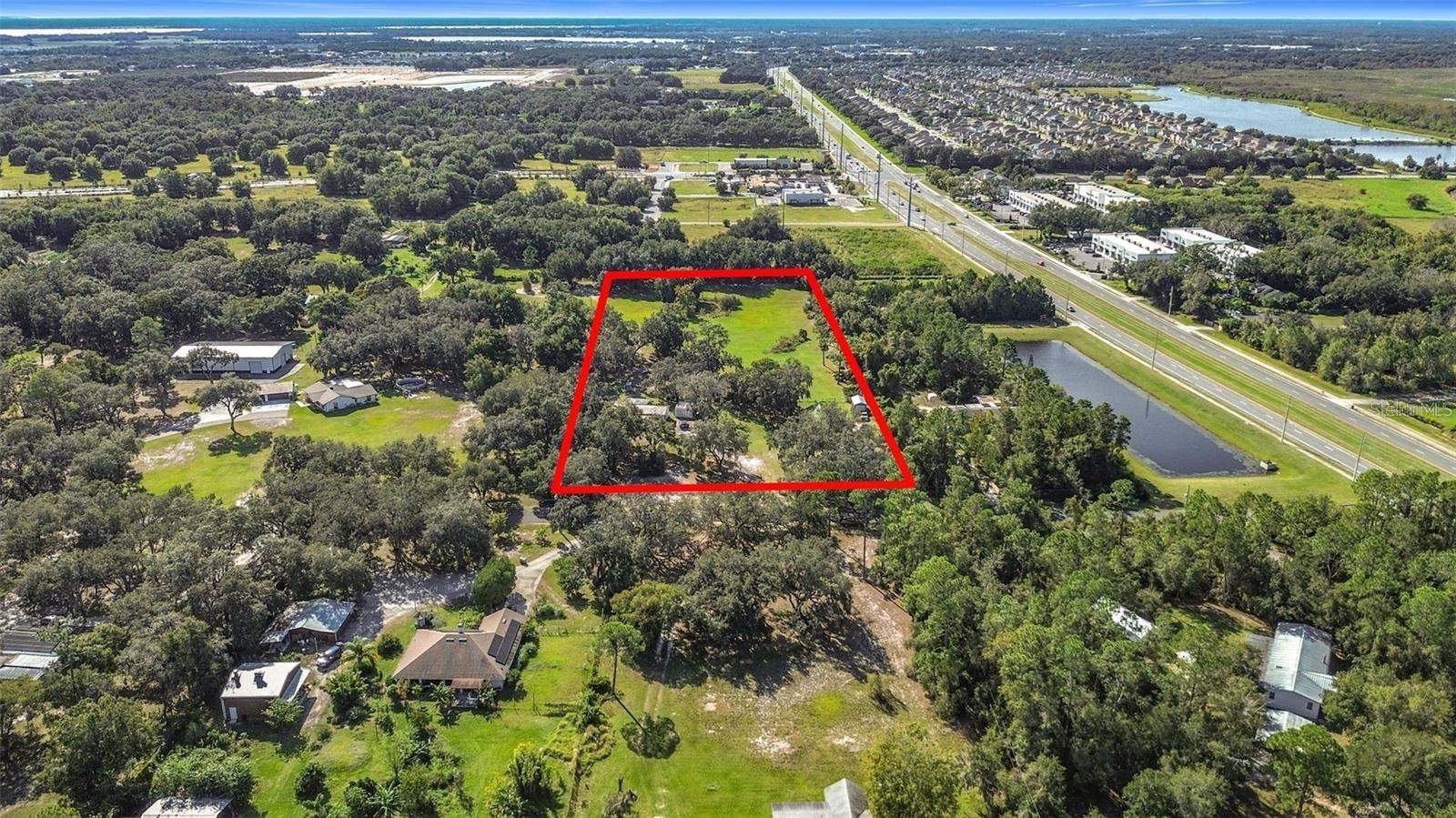 5 acre Investment opportunity off of Narcoossee Road. Within the county limits but adjoins the City Limits of St Cloud. Value is in the land. Bring all offers.
