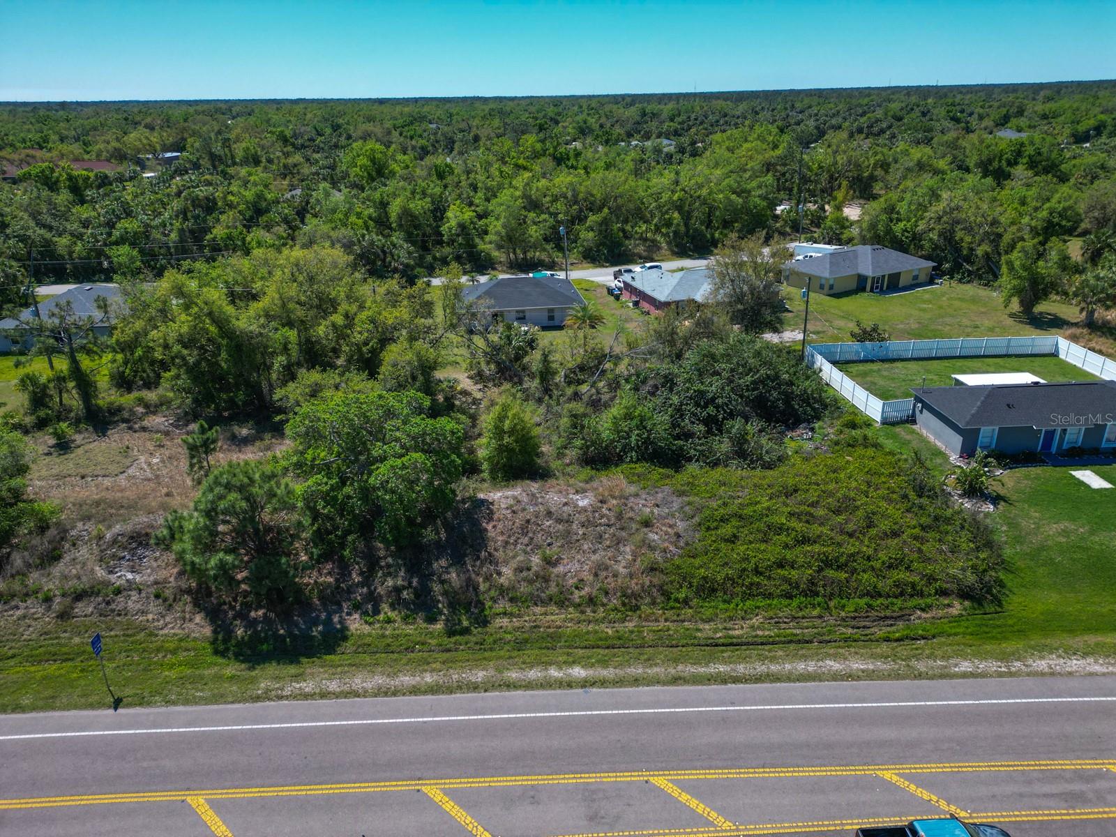 RARE DOUBLE VACANT LAND on Price Blvd available, just minutes from I-75, making trips to Sarasota, Venice, Port Charlotte, or even Naples quick and convenient. You’ll also be just a short drive from Wellen Park, a new community full of shops, dining, parks, walking trails, live entertainment, and the Atlanta Braves Spring Training stadium.The City of North Port continues to pop with new homes, schools, and businesses, which makes this the perfect time to secure your piece of land here in Sarasota County. Whether you are a home builder looking to build your MODEL HOME or if your looking just just build your DREAM HOME, don't stress as there are NO HOA restrictions, plus you’re close to Gulf beaches, golf courses, and beautiful nature preserves! Whether you’re dreaming of building your forever home or looking for a smart investment, this location checks all the boxes. And if you’d like assistance on the building process, our trusted custom home builder is available to walk you through every step and answer your questions!