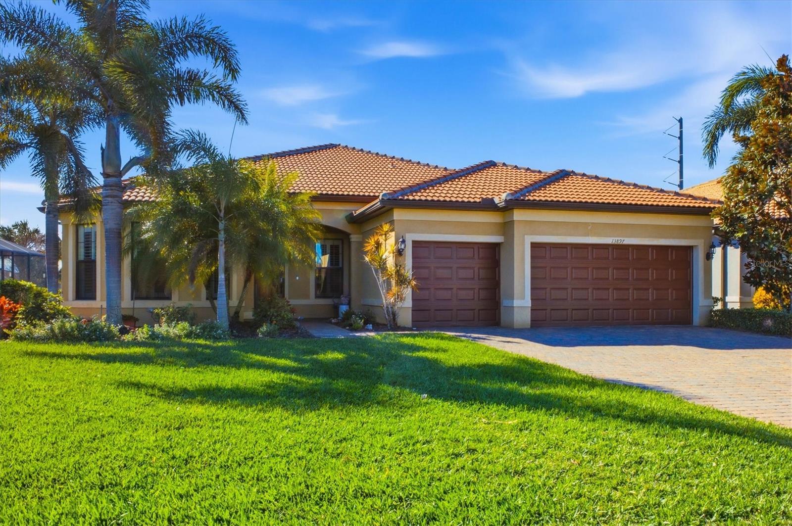 Welcome to this beautifully appointed and meticulously maintained home in the highly sought-after resort-style community of Islandwalk at the West Villages. This highly desirable Pinnacle model features 3 bedrooms, 3 bathrooms, plus a den/office, an extended lanai with outdoor kitchen, pond views, and a 3-car garage. This spacious home offers 2,516 sq. ft. of elegant living space. The open floorpan highlights the gorgeous gourmet kitchen which is thoughtfully designed with a huge island perfect for entertaining. You'll be wowed with the quality stainless steel appliances, quartz countertops, under-cabinet lighting, pull-out shelving, an upgraded hood vent, and raised-panel cabinetry. Additional upgrades throughout the home include designer flooring, crown molding, tray ceilings, plantation shutters, and zero-corner pocket sliding glass doors, creating a refined yet inviting atmosphere. New A/C in 2025, New hot water heater 2024 and new Refrigerator in 2024. Hurricane impact windows throughout the home for your peace of mind. Enjoy seamless indoor-outdoor living on the extended screened lanai with an outdoor kitchen, ideal for entertaining while taking in tranquil water views. Islandwalk is a resort-style community known for its lush Florida landscaping and impressive amenities, including tennis, pickleball, and bocce ball courts, a resort pool, lap pool, fully equipped fitness center, clubhouse, and event center. Ideally located just minutes from Wellen Park with entertainment, shopping, dining, the Atlanta Braves Spring Training facility, championship golf courses, and pristine Gulf beaches! This home perfectly blends luxury, convenience, and the ultimate Florida lifestyle. Don’t miss this exceptional opportunity—welcome to the epitome of Florida living!