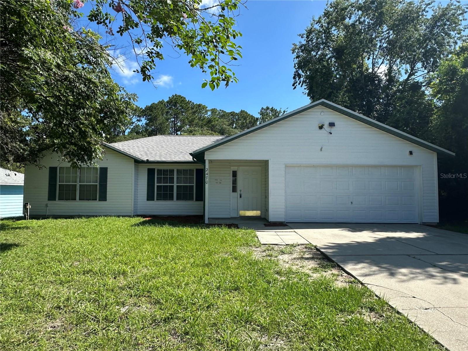 Welcome to 2470 Laval Drive in Deltona Lakes! Priced to sell quick, this property offers an exceptional opportunity in one of Central Florida's most affordable and desirable communities. Beautiful ceramic tile throughout. A/C and Roof were both replaced in June 2025 with permit and warranty. Conveniently located along the I-4 Corridor, Deltona sits halfway between Orlando and Daytona Beach and is only 30 minutes from the Atlantic Coast beaches. Known for its strong rental demand, affordability, and highly rated Volusia County Schools, Deltona continues to attract families, commuters, and investors alike. A great opportunity to own in a growing market with excellent long-term potential.  Great for an Investment property or Primary residence!