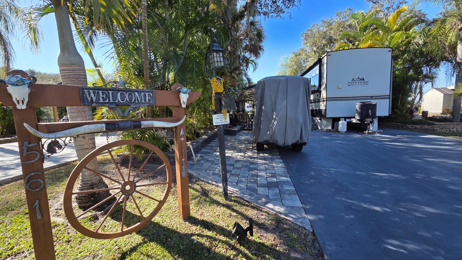 Waterfront Paradise!  Experience the ultimate Florida lifestyle at 561 Waterway Drive. Situated in the highly coveted Phase 5 of River Ranch RV Resort, this spacious 40x92 big-rig friendly lot is move-in ready for personal use or immediate rental income. A true boater’s dream, the property includes a private dock with direct access to the world-class Kissimmee Chain of Lakes. The expansive outdoor living space is anchored by a massive custom pavilion for all-weather camping, complemented by multiple seating areas, mature shade trees, and a full-sized storage shed. This premium lot offers enhanced privacy with a common area directly across the street, ensuring no immediate front neighbors.  RV can be purchased separately!

River Ranch is Florida’s premier luxury RV destination located just one hour south of Orlando. The all-inclusive $942 quarterly HOA covers water, sewer, cable, internet, lawn care, trash, and 24/7 gated security. Owners enjoy exclusive access to a private lounge, billiards, poker room, and fitness center, while the resort offers endless entertainment including weekly live rodeos, a saloon with live bands, a waterpark, petting farm, and an adventure park. On-site dining options range from fine dining at the Chop House to waterfront BBQ and a Starbucks-serving coffee shop. Whether you are a snowbird or an investor, this pet-friendly paradise with no RV restrictions is a perfect fit.