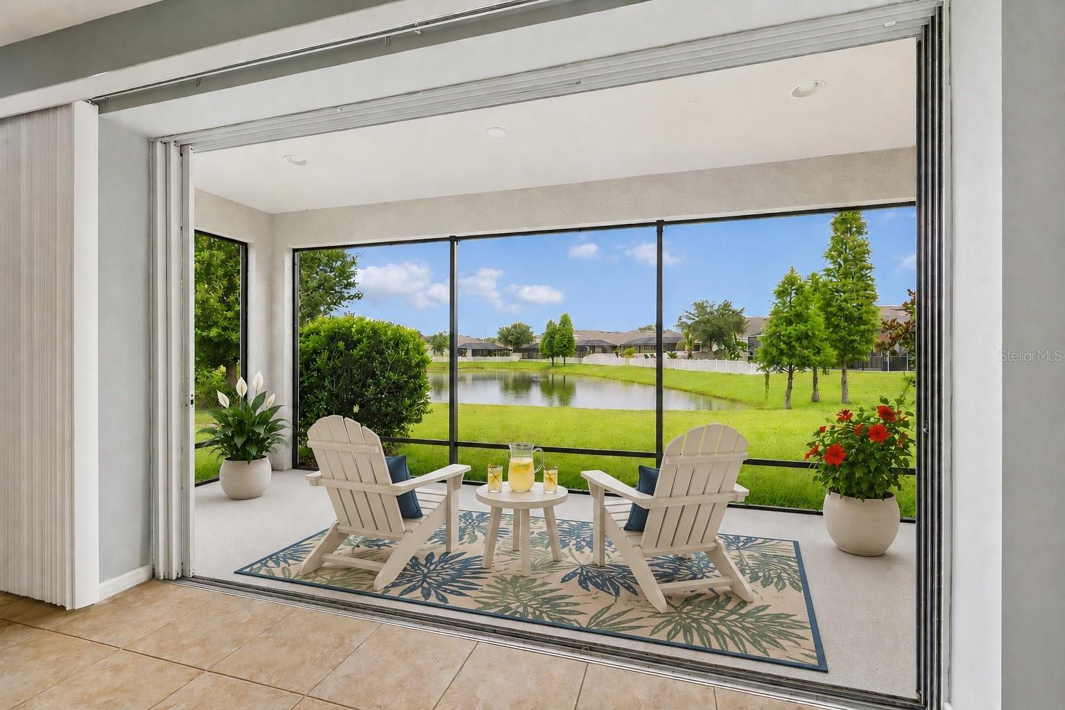 Virtually Staged. NO CDD! NO FLOOD INSURANCE! Enjoy tranquil pond views and the convenience of living directly across from one of the community pools in the desirable Enclave at Channing Park.
This 4-bedroom, 3-bath home offers a versatile floor plan with plenty of space to live, work, and entertain. From the moment you step inside, you'll appreciate the tray ceilings, art niches, and the impressive lighted rotunda that create an inviting first impression.
The open kitchen and Great Room provide a comfortable gathering space with beautiful pond views. The kitchen features granite countertops, abundant cabinetry, a butler's pantry with additional storage and serving space, and a large walk-in pantry. Triple sliding glass doors lead to the screened lanai, where you can relax and enjoy the tranquil water views.
A flexible bonus room can be used as a formal dining room, home office, media room, or hobby space.
The spacious primary bedroom features tray ceilings and an ensuite bath with dual vanities, a soaking tub, separate walk-in shower, and direct access to the laundry room. The thoughtfully designed laundry room also has a second entrance from the hallway serving the secondary bedrooms, offering added convenience.
Additional features include neutral ceramic tile flooring, surround sound in several rooms, a hardwired Ethernet network providing fast, reliable connectivity for remote work, streaming, gaming, and other high-bandwidth needs, and a screened lanai overlooking the pond.
Residents of The Enclave enjoy their own private community pool and cabana, while also having access to Channing Park's outstanding amenities, including a second resort-style pool with spa, fitness center, Buccaneer's Pirate Splash Zone, basketball courts, soccer fields, a dog park, playgrounds, picnic areas, and a skateboard park.
Conveniently located near FishHawk Ranch, Park Square, shopping, dining, top-rated schools, and with an easy commute to downtown Tampa and MacDill Air Force Base, this home offers an exceptional combination of location, comfort, and community amenities.