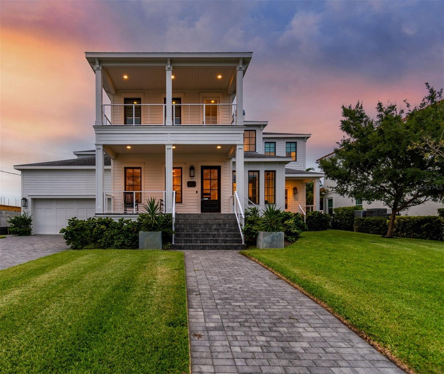 Welcome to 5811 Mariner Street.  Set in the sought after waterfront enclave of Mariner Estates in Beach Park on the open waters of Tampa Bay, this spectacular 5006 sf builder's own custom home exemplifies the best of contemporary coastal design, timeless style and stunning location.  The home features 5 bedrooms, 5.5 baths, plus an office.  The first floor offers a beautiful and private in law or guest wing, formal living and dining rooms, with views of the bay, open floor plan with chefs kitchen overlooking the great room and a 170 bottle wine room.  The second floor primary suite is unequaled in its spa like atmosphere.  Outdoors enjoy the spectacular resort style pool and private dock and boat  lift.  Enjoy the luxury of true waterfront living in Mariner Estates, located minutes to famed Tampa International Airport, top rated public and private schools, world class luxury shopping and dining at International Plaza and Hyde Park Village, Westshore, Midtown and Downtown Business Districts, and the Nation'sTop Beaches.  You can have it all!