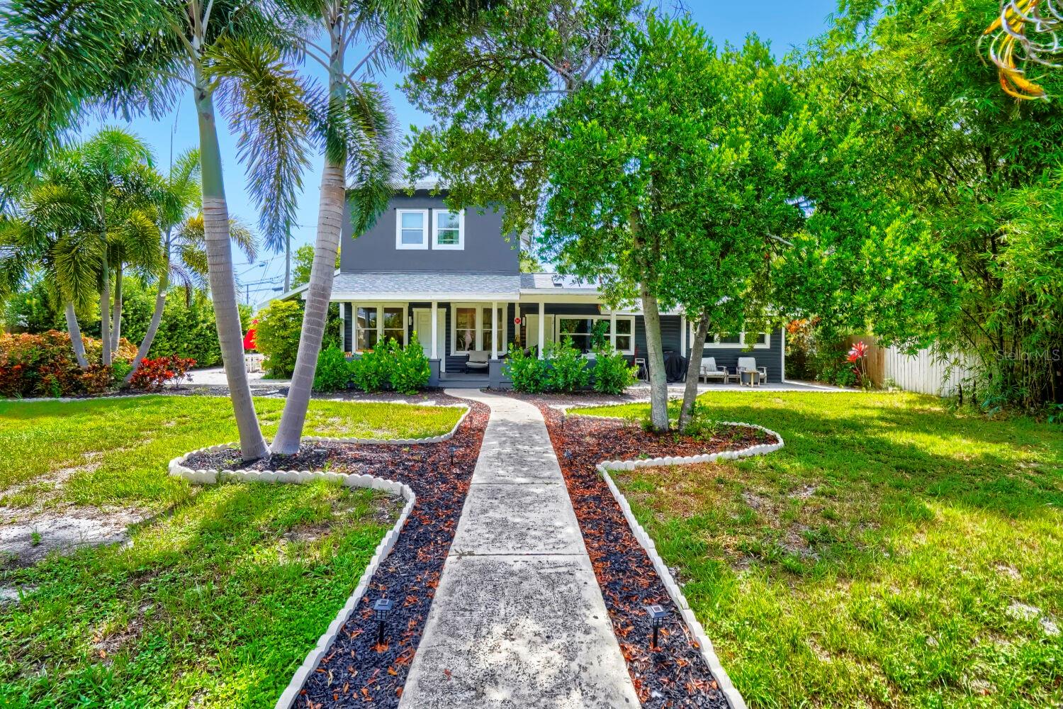 THE HISTORIC NORTH KENWOOD COMPOUND. Start your compound in the heart of St. Petersburg. Some properties are simply investments. Others become a lifestyle, a legacy, and a place for generations to gather. Set on an oversized 11,430-square-foot double lot in Historic North Kenwood, this rare four-unit property offers flexibility that is becoming increasingly difficult to find. Live in one unit and generate income from the others. Create a multigenerational compound. Build an urban homestead. Or simply enjoy owning a piece of St. Petersburg history with room to grow. The centerpiece of the property is a beautifully restored residence featuring soaring 12-foot ceilings, original hardwood floors, restored crown molding, updated kitchen and bath, new windows, and new HVAC. Historic character and modern comfort come together in a way that cannot be replicated today. The property currently offers four separate living spaces, creating opportunities for owner-occupants, investors, extended families, creatives, remote workers, and entrepreneurs seeking flexibility under one roof. Recent improvements include: New roof serving all units, Updated electrical systems, Renovated kitchens and baths, New HVAC systems, New windows, Fresh interior and exterior paint, Restored historic architectural details. But what truly sets this property apart is the land. The oversized double lot creates possibilities rarely found this close to downtown St. Petersburg. Imagine harvesting fruit from your own trees, cultivating raised garden beds, creating an urban farm, gathering fresh eggs, building a greenhouse, designing a private courtyard, adding outdoor entertainment areas, installing a putting green, creating play spaces, or simply enjoying room to breathe in the middle of the city. Few properties allow you to combine income-producing real estate, historic architecture, and a modern homestead lifestyle in one location. Located just minutes from downtown St. Petersburg, the Grand Central District, Booker Creek Park, restaurants, breweries, coffee shops, and waterfront attractions, this property delivers both convenience and opportunity. Whether your vision is a family compound, urban farm, income-producing residence, house-hack, multigenerational estate, or long-term wealth-building asset, this property provides a foundation that is increasingly difficult to acquire. They aren't making more historic double lots. Bring your vision. Create the lifestyle. Build your compound.
OWNER-OCCUPANT OPPORTUNITY
Qualified buyers may be eligible for owner-occupied multifamily financing programs designed for two- to four-unit properties. Certain renovation loan programs may allow buyers to finance both acquisition and eligible improvements through a single mortgage, creating the opportunity to customize, modernize, and add value while living on-site. Current conforming loan limits for owner-occupied four-unit properties exceed $1.6 million, subject to lender requirements, appraisal, underwriting approval, and program guidelines. Buyers should independently verify financing options, renovation eligibility, loan limits, zoning, permitting, and any intended future use of the property.