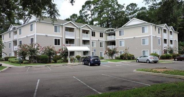 4 bedroom, 4 bathroom Countryside at the University ground level unit located less than a mile from the University of Florida. These units have an open plan with kitchen and breakfast bar that opens to a living room and dining room. Each corner has it own bedroom with a private bathroom and walk-in closet. There is a covered porch off the living area with additional storage closet. The closet off the living room has a washer and dryer. Brand New Water Heater March 2023. New LVP Throughout 2020. New Vanity sinks and Toilets 2020. Property amenities include high speed internet, community pool and hot tub, fitness room, basketball court and sand volleyball court. This condo is located on the bus route and convenient to UF, Shands Hospital, VA Hospital, Butler Plaza shopping and Celebration Pointe.