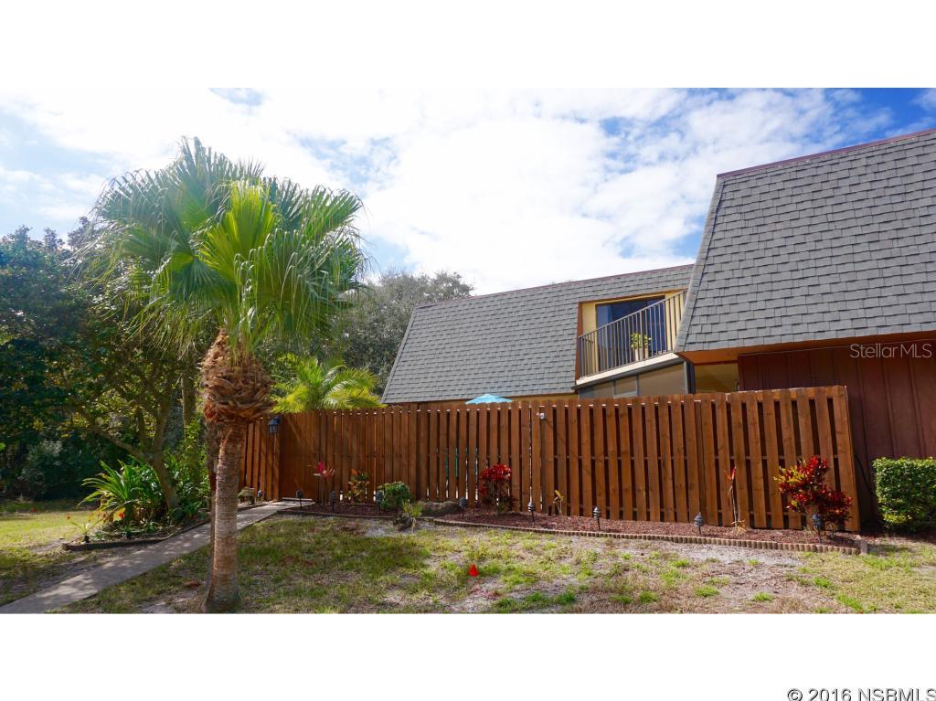 Beachside Beauty is this 3 bdrm, 2.5 bath home just minutes from the beach. Privacy says it all!  The sound of tropical wildlife and palms swaying in the winds during the morning hours and the roar of the ocean in the distance at night gives this home a happy feeling. The shadow fenced and tiled patio has a screened in section which is great for morning coffee and makes outdoor entertaining comfortable. Sun worshiper? Take a break from the beach and enjoy the sun from the second floor balcony facing a wooded area. First floor bedroom could be used for an office. Whether you need a permanent beachside home or a vacation beachside home this one is worth taking a peek at. Purchasing it all furnished is possible. Just bring your tooth brush! ;Water: City