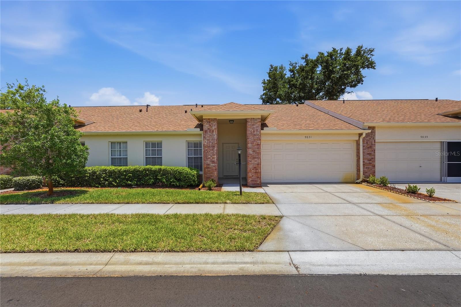 Welcome to easy, maintenance-free living in the highly desirable 55+ community of Heritage Lake! This well-maintained 2-bedroom, 2-bathroom home offers a bright and inviting open floor plan designed for both everyday comfort and effortless entertaining. You'll appreciate the abundance of closet and storage space throughout, providing plenty of room for all your belongings. The spacious living and dining areas flow seamlessly into the enclosed screened porch, creating the perfect place to enjoy your morning coffee, unwind with a good book, or entertain guests while enjoying Florida's beautiful weather year-round.  Additional features include an attached 2-car garage, convenient inside laundry room, and a functional layout that maximizes both space and natural light. Heritage Lake residents enjoy an active lifestyle with access to a welcoming clubhouse, community pool, and a variety of social activities and events designed to help neighbors become friends.  
Ideally located in the heart of New Port Richey, you'll be just minutes from shopping, dining, medical facilities, parks, and the area's beautiful Gulf Coast beaches. Commuters and travelers will appreciate the easy access to both Tampa International Airport (approximately 30 minutes) and St. Pete-Clearwater International Airport (approximately 40 minutes). Whether you're looking for a seasonal retreat or your next full-time residence, this home offers the perfect combination of comfort, convenience, and community living. Schedule your private showing today!