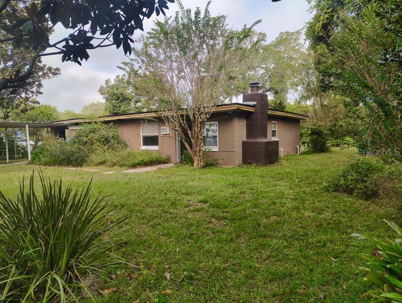 Opportunity to complete this cute property to your own taste.  The big ticket items have been done with a new Electrical box/panel and new roof.  There are no fixtures in bathroom or kitchen, so it is ready for you to design.  This is a cute property with fruit trees, mature landscaping and fence.  The property is fully fenced with a gate across drive way to separate from Hwy 42.  Home needs work, but this is a great opportunity for an affordable property for someone handy.  Most of the demo work has been completed, so it is ready for your installations.  Large carport with workshop at the back.