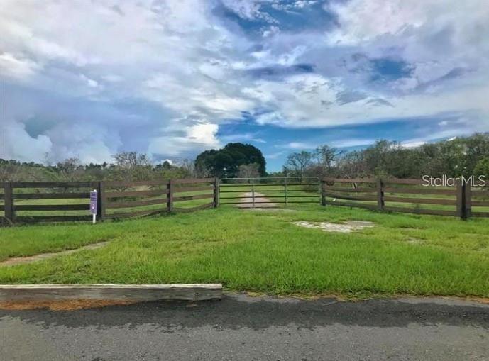 Probably the finest site for a huge estate home in Orange County!  No need to move almost an hour away to Montverde just to find enough land to build your private estate or Equestrian estate when this gem is minutes to Windermere and everywhere you want to be.  This highly sought after 10 acre property in the Lake Avalon rural settlement, is a declining citrus grove and sits on the highest elevation in West Orange County, which affords it incredible views in every direction.  If you build a two story home on the property with a balcony situated just right, you can see all the way to Orlando, Windermere, and the nightly Walt Disney World fireworks.  There is a contract in place for reclaimed water for irrigation and a clean well on the property for drinking water.  This dream property is just minutes from the thriving downtown Winter Garden Village, Hamlin center, downtown Windermere and minutes to the 429 expressway to downtown Orlando, Disney, and all major shopping , dining, and attractions.  This lot is a rare find!  There is nothing like it on the market, and there never will be again, as quality parcels of country real estate are disappearing.  Don't miss your chance to own your dream piece of country paradise!