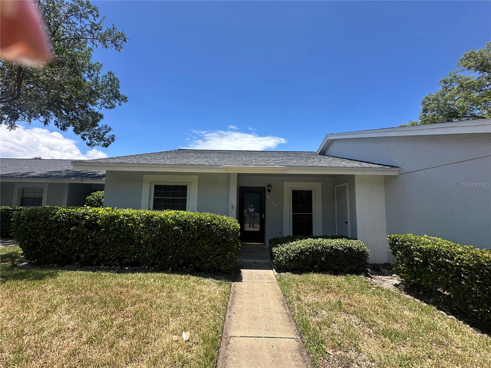 Enjoy the Florida lifestyle you've been dreaming of in the highly sought-after 55+ Beacon Woods Golf Club
community! This beautifully maintained 2-bedroom, 2-bath condo offers 1,129 square feet of comfortable,
easy-care living with 8-foot ceilings and a desirable split-bedroom floor plan. The bright, open living room
extends through sliding glass doors to a spacious enclosed lanai—perfect for morning coffee, relaxing with a
book, or entertaining friends. A convenient utility closet on the lanai adds extra storage and functionality. Enjoy
truly maintenance-free living with condo fees that include exterior and grounds maintenance, water, sewer,
trash, basic cable, pest control, and escrow reserves. Resort-style amenities include two heated pools, a
relaxing spa, clubhouse, fitness center, tennis courts, parks, and an active social calendar, making it easy to
enjoy every day. Conveniently located near shopping, restaurants, medical facilities, and the beautiful Gulf
beaches, with Tampa International Airport just 45 minutes away. Don't miss this opportunity to enjoy the
comfort, convenience, and vibrant lifestyle.