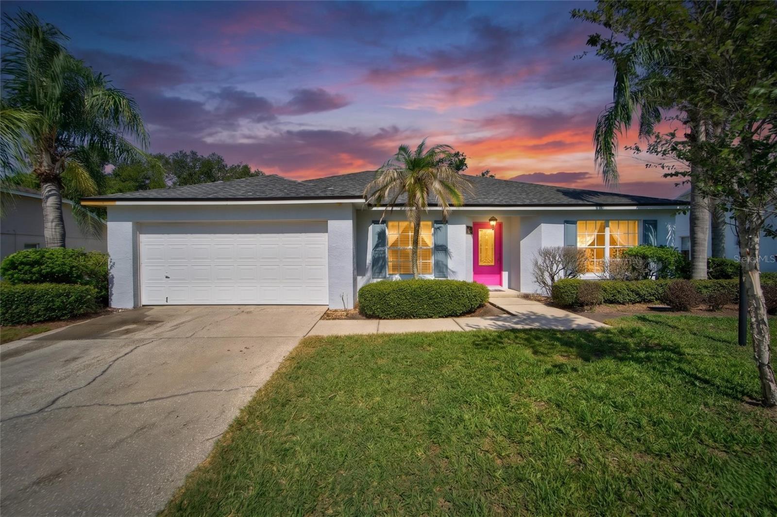 From the moment you arrive, you'll appreciate the pride of ownership and inviting curb appeal that make this home stand out. Nestled in the highly sought-after Scott Lake area of South Lakeland and served by highly regarded schools, this beautifully maintained home offers the perfect blend of comfort, convenience, and lifestyle. Step inside to soaring vaulted ceilings and a spacious split-bedroom floor plan offering 1,659 heated square feet of comfortable living space, including separate living, dining, and family rooms designed for both everyday living and entertaining. The kitchen features abundant cabinet and counter space, beautiful custom cabinetry, granite countertops, a convenient breakfast bar, and a cozy breakfast nook, creating the perfect gathering place for meals and conversation. The private primary suite offers a walk-in closet, double vanity, and walk-in shower for added comfort and convenience. Custom cabinetry and granite countertops in the bathrooms add an upgraded touch throughout the home. Enjoy Florida living year-round from the covered lanai overlooking the screened-in pool and spa. Whether you're cooling off with a swim, relaxing in the hot tub, or hosting friends and family, this outdoor space is designed to be enjoyed. The fully fenced PVC backyard provides exceptional privacy and plenty of room for outdoor activities. Major updates provide peace of mind, including a newer roof with transferable warranty, newer air conditioning system, updated pool screen enclosure, and a hot tub that is only four years old. Additional improvements include quality GE kitchen appliances, luxury laminate flooring throughout most of the home, upgraded front entry doors, decorative trim work, updated lighting, interior paint, and exterior paint completed approximately five years ago. Located within a quiet gated community close to shopping, dining, parks, recreation, medical facilities, and major transportation routes, this move-in ready home combines comfort, privacy, and value in one of South Lakeland's most desirable locations. Enjoy the convenience of nearby access to the Polk Parkway, providing an easy commute throughout Central Florida and quick