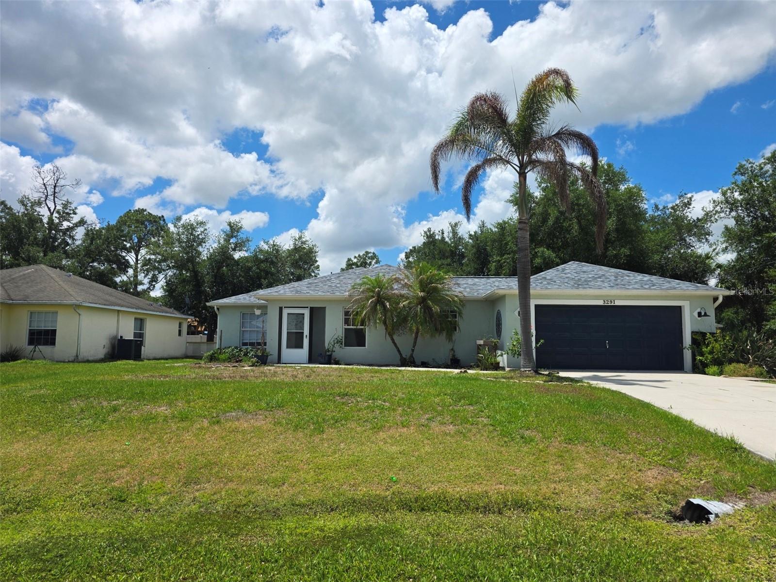 Come see this beautiful 3-bedroom, 2 bath home with an open floor plan located in Noth Port. This home provides easy access to I-75 being in the middle of Sumter Blvd and Toledo Blade Blvd exit. When you step into the front door, you will see a large living room with cathedral ceiling and view to the backyard from a sliding door. The kitchen has a beautiful wood cabinetry, a large breakfast nook, and a large center island with tons of storage. The master suite provides direct access to the backyard, a large walk-in closet, and a beautiful bathroom with double vanities and tiled walk-in shower. New tile flooring was installed throughout the house in the past year. Call today to book an appointment to come see this property.