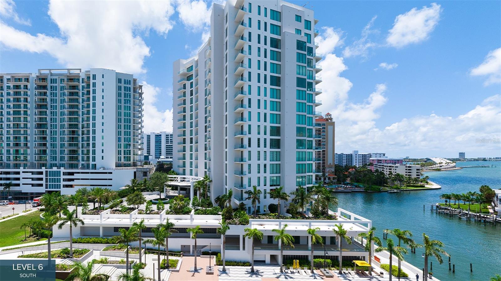 One or more photo(s) has been virtually staged. Pre-Construction. To be built. This penthouse with three exposures sweeping across Sarasota Bay to the downtown skyline, Residence A is an invitation to experience the beauty of natural light from sunrise to sunset. Three private terraces, one with an outdoor kitchen, are accessed from the great room, which features 13-foot ceilings, an open-plan kitchen and large walk-in pantry. A cozy den is ideal for relaxing with a book or movie, and a powder room is convenient for visitors. Two guest suites open to a third, city-view terrace, while the third guest suite is set in a corner, where it enjoys marvelous water-to-skyline views. The thoughtfully designed primary suite offers two walk-in closets, a spa-style bath with a deep soaking bathtub, double vanity and double shower. In The Ritz-Carlton global tradition of peerless service, this private residence will enjoy a dedicated on-site team that takes pride in anticipating every need and fulfilling every wish. A 24-hour dedicated staff and concierge, food and beverage services available from private, on-site service kitchen, dedicated 24-hour valet,
housekeeping services and an impressive array of private amenities overlooking the sparkling yacht harbor. In addition to exceptional private amenities and services available exclusively to tower residents, membership in The Harbor Club provides access to nearly 20,000 square feet of amenities dedicated to socializing, health and wellness.